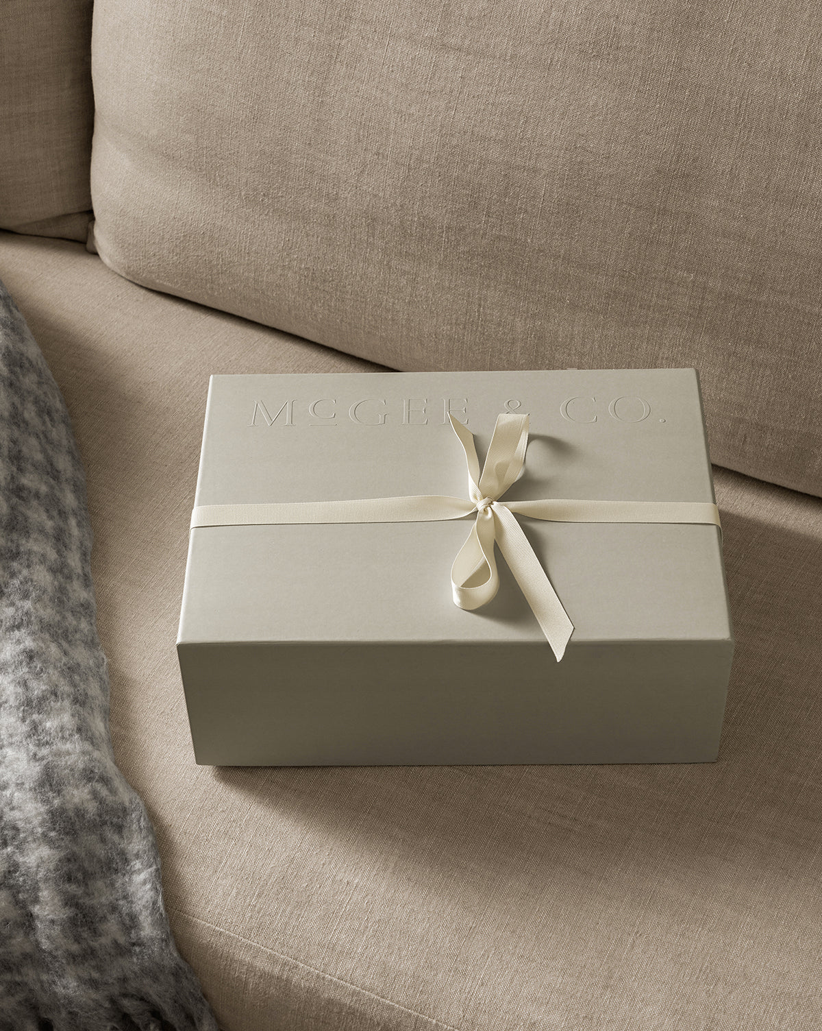 Embossed with “McGee & Co.,” the box hints at the luxurious Salt & Sea Gift Set inside, by McGee & Co.