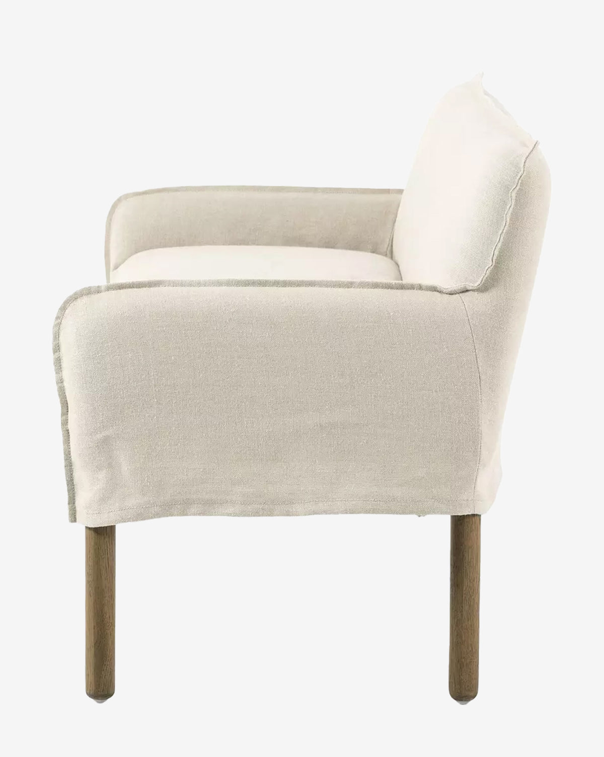 Side view of the Aiken Slipcover Bench with linen upholstery and wooden legs, featuring a cushioned seat, clean lines, and a simple, minimalist design, by McGee & Co.