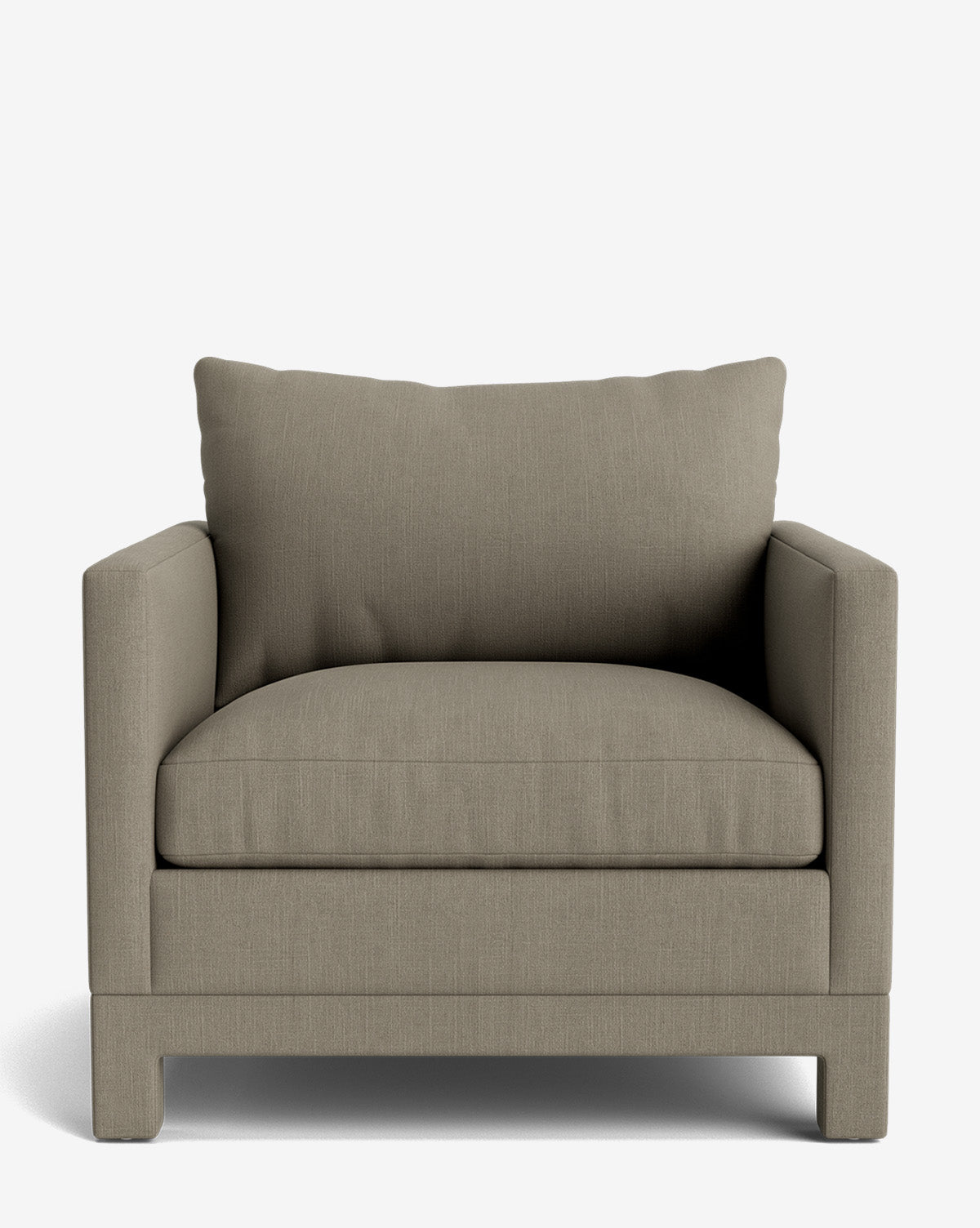 The Appoline Lounge Chair from our Upholstery Collection features a thick seat cushion, wide armrests, and a matching back cushion. This modern chair has light brown fabric, a boxy shape, and short block legs by McGee & Co.