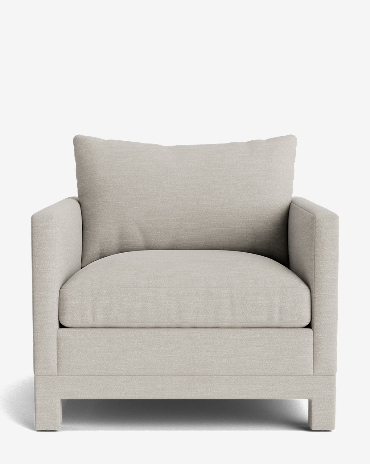 The Appoline Lounge Chair from our Upholstery Collection features light beige made-to-order upholstery, a thick seat cushion, large back pillow, straight armrests, and a simple wooden base for a modern look, by McGee & Co.