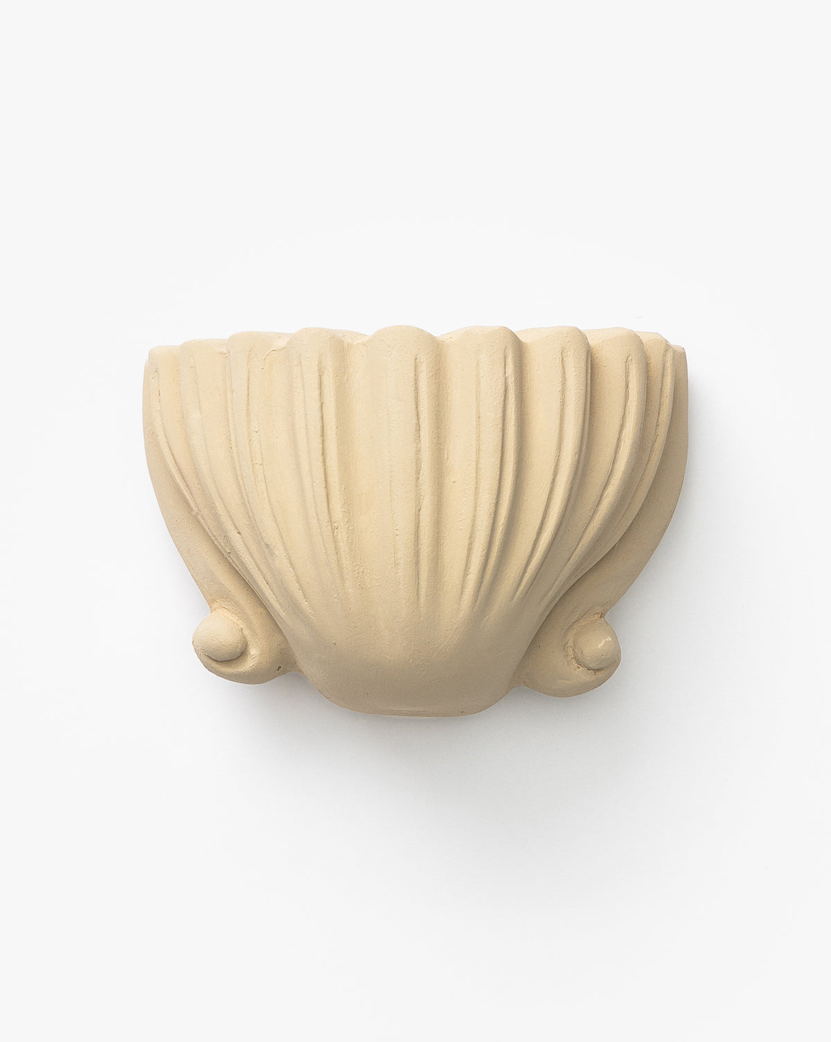 The Baroque Shell Object is a beige, shell-shaped ceramic wall planter with two small curled decorative accents at the bottom, displayed against a plain white background.