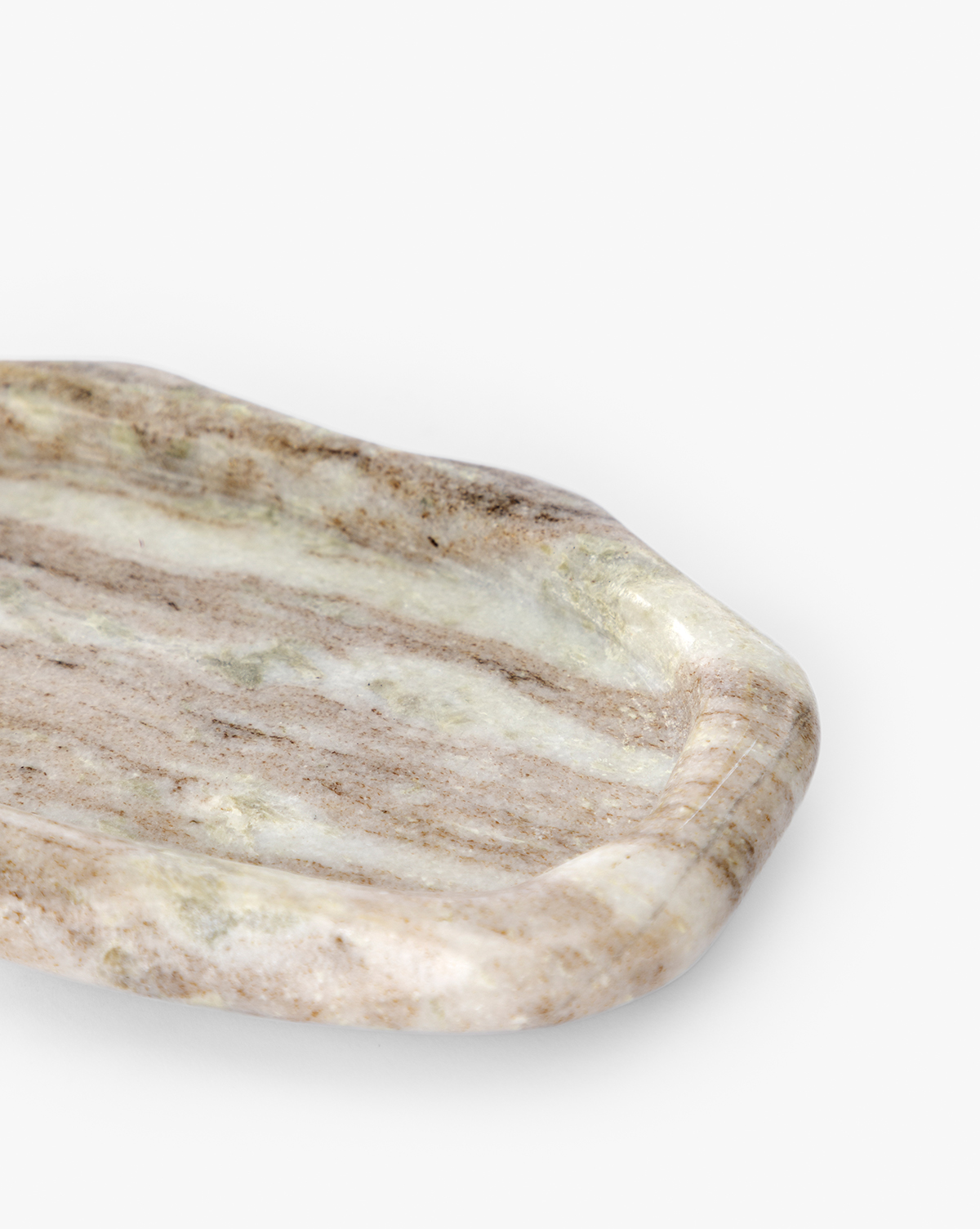 A close-up of the Bristol Tray, a rectangular marble tray with rounded edges and natural beige and gray veining, perfect as a bathroom vanity organizer, set against a white background, by McGee & Co.