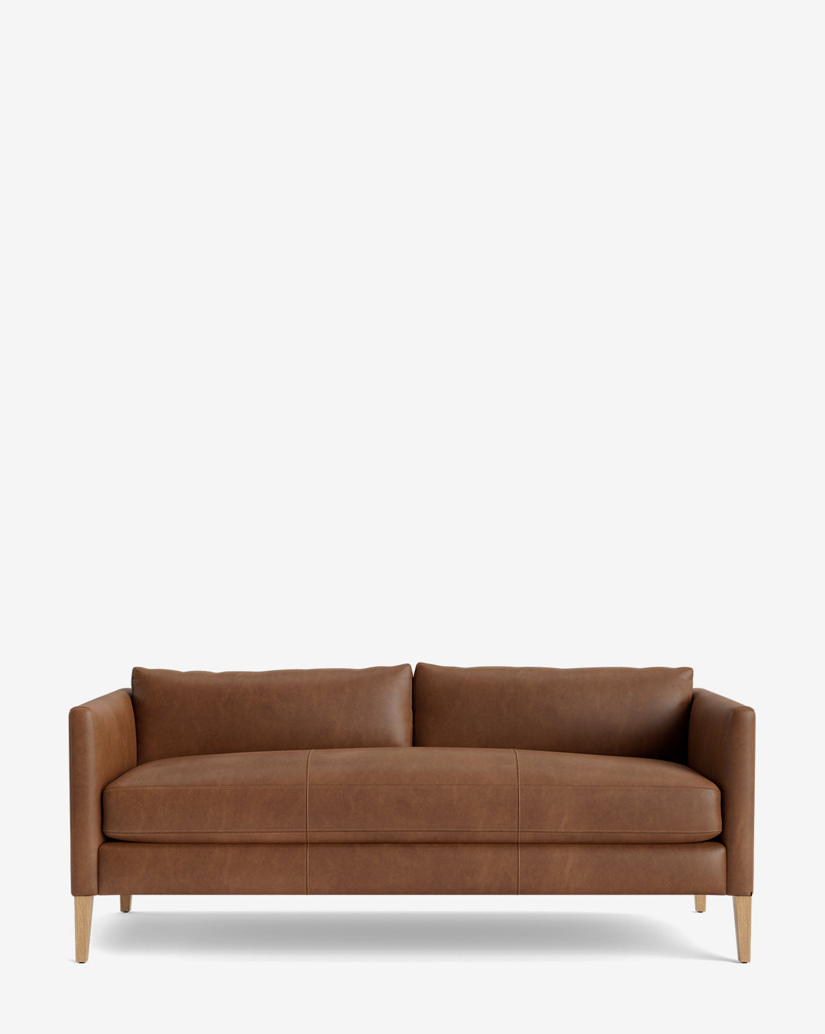 The Cade Sofa 80 features a modern design with brown leather upholstery, a single cushion seat, two back cushions, clean lines, and wooden legs, shown against a plain white background by McGee & Co.