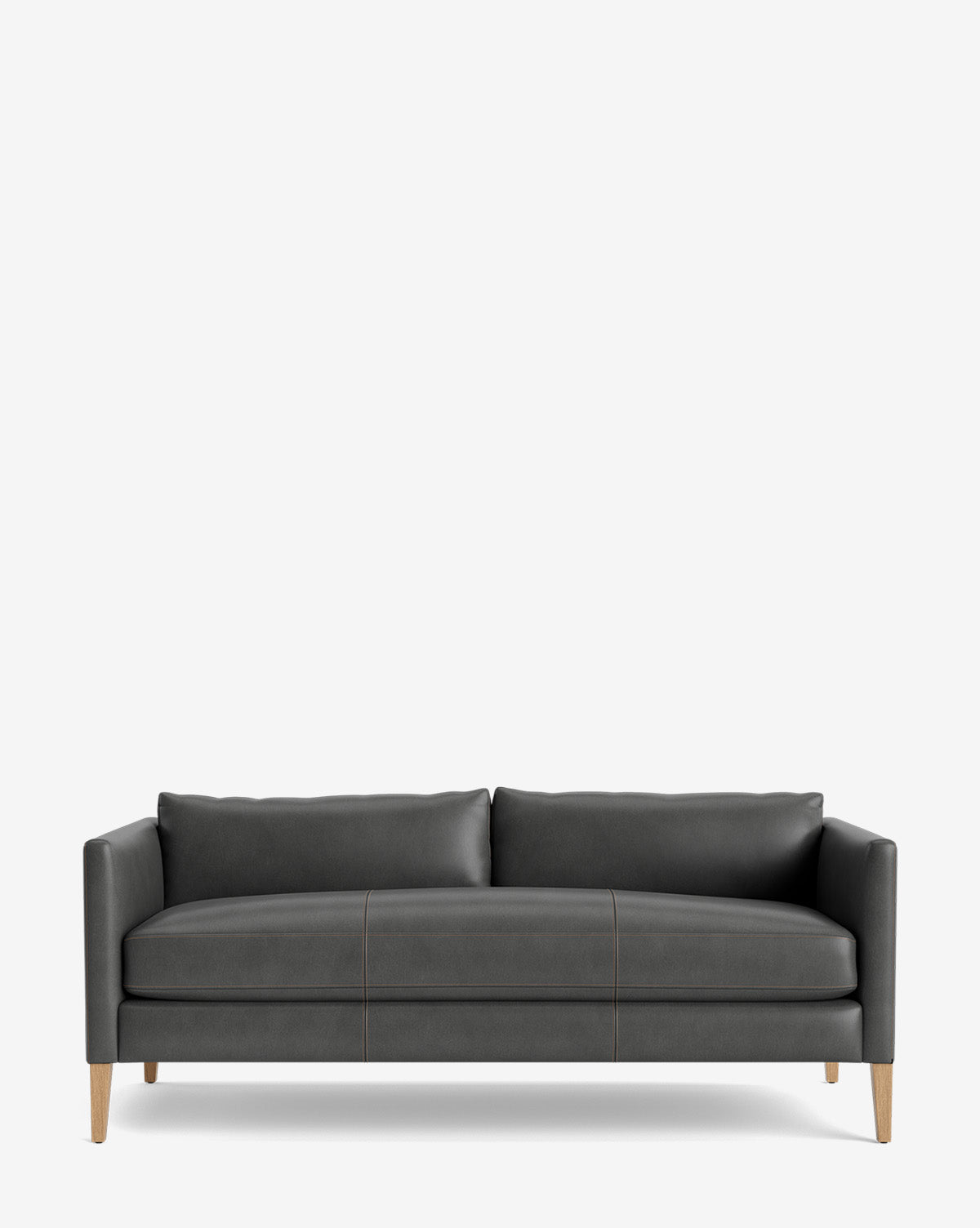 The Cade Sofa 80 is a modern down-wrapped dark gray leather sofa with wooden legs, straight arms, and two seat and back cushions, shown on a plain white background by McGee & Co.