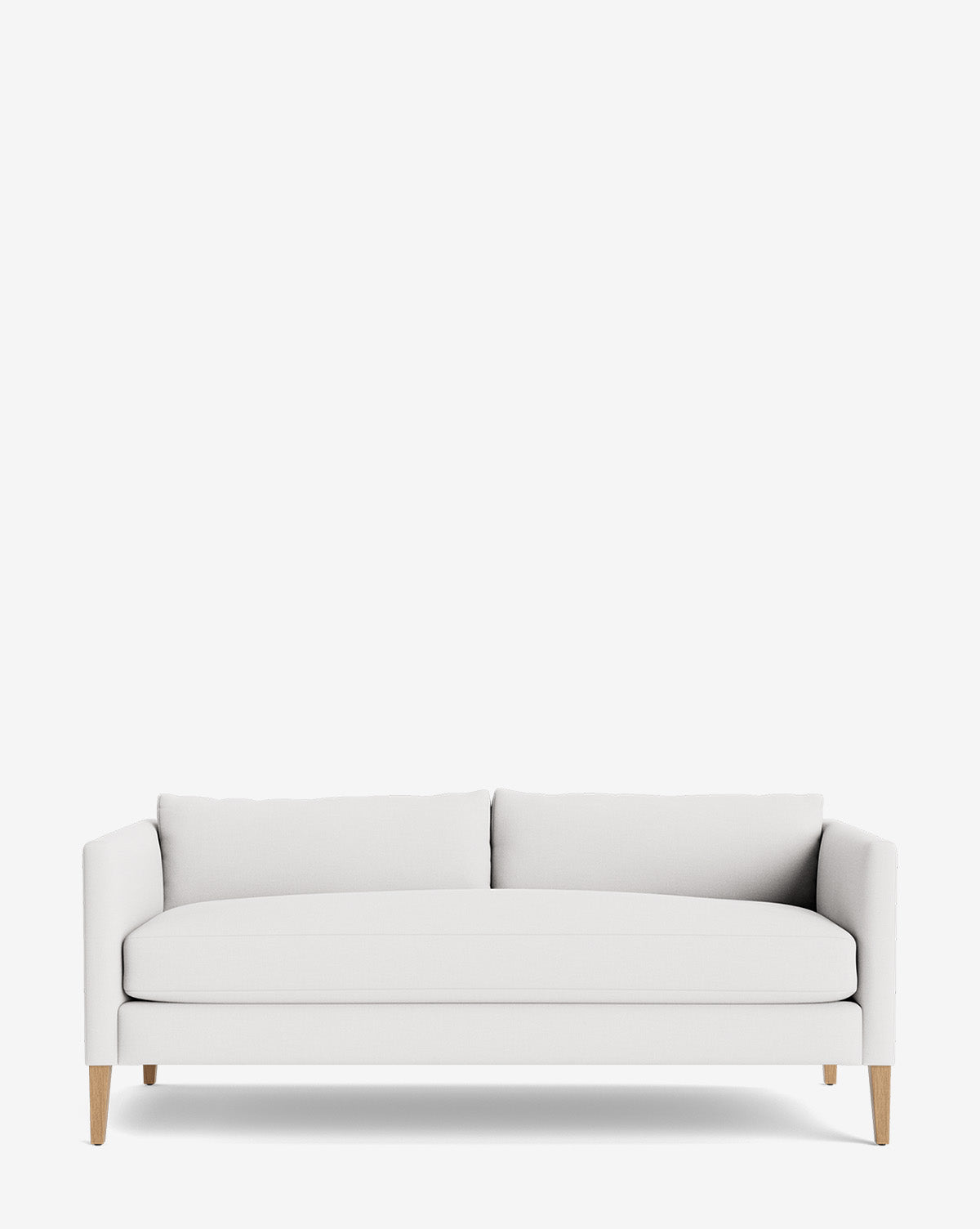 The Cade Sofa 80 features clean lines, two seat and back cushions, and light wooden legs. Down-wrapped for extra comfort, this modern sofa blends contemporary style with inviting softness against a white background, by McGee & Co.