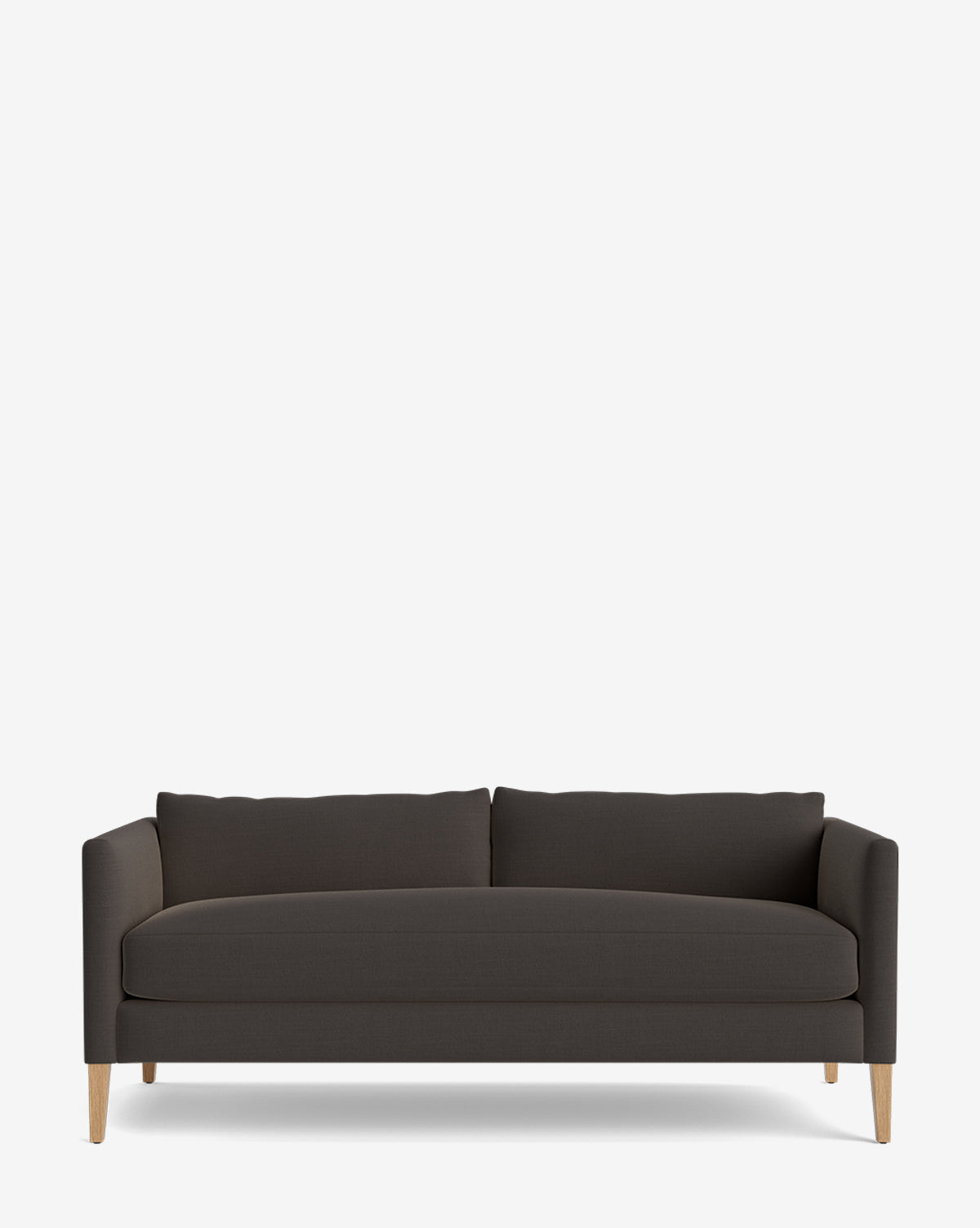 The Cade Sofa 80 is a modern, dark gray single-cushion sofa with clean lines, low arms, wooden legs, and two down-wrapped back cushions, shown against a plain white background by McGee & Co.