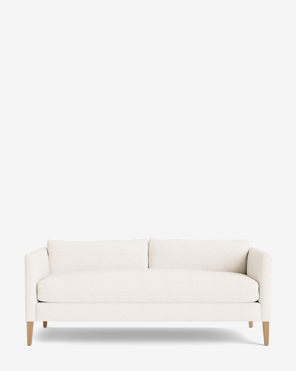 The Cade Sofa 80 is a modern, white upholstered sofa featuring down-wrapped cushions, clean lines, two seat cushions, and light wooden legs, shown against a plain white background by McGee & Co.