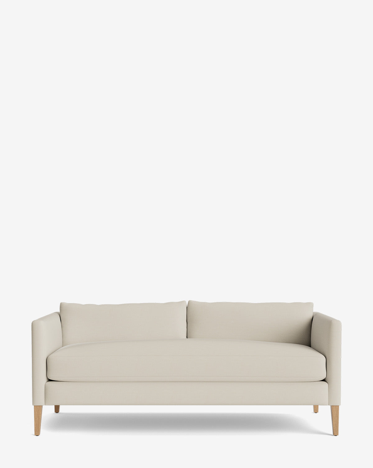 The Cade Sofa 80 is a modern, light beige sofa with clean lines, a low backrest, two back cushions, down-wrapped seats, and slightly tapered wooden legs, shown against a plain white background by McGee & Co.