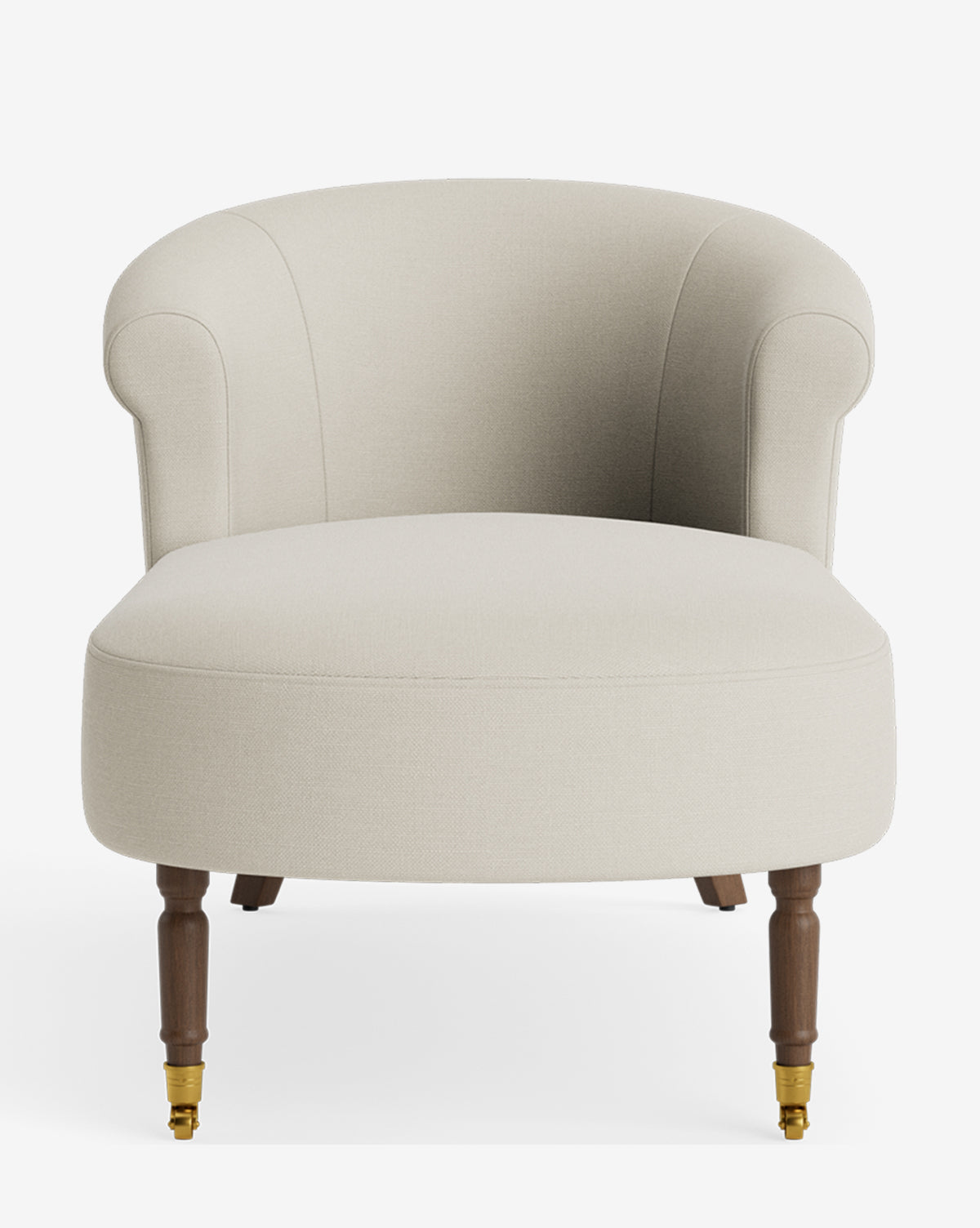 The Clemence Chaise is a light beige upholstered armchair with a curved backrest, rounded arms, and wooden legs featuring brass casters on the front two legs, offering customizable style shown against a white background by McGee & Co.