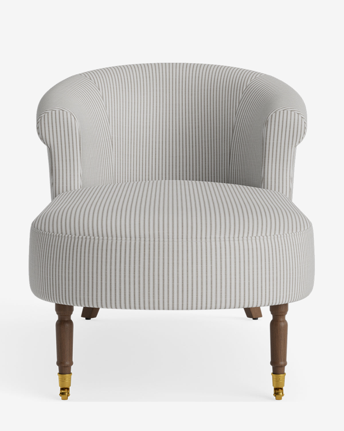 The Clemence Chaise is a grey and white striped upholstered chair with a rounded back, rolled arms, and wooden legs—two with brass caster wheels—offering classic elegance for anyone seeking timeless, customizable furniture by McGee & Co.