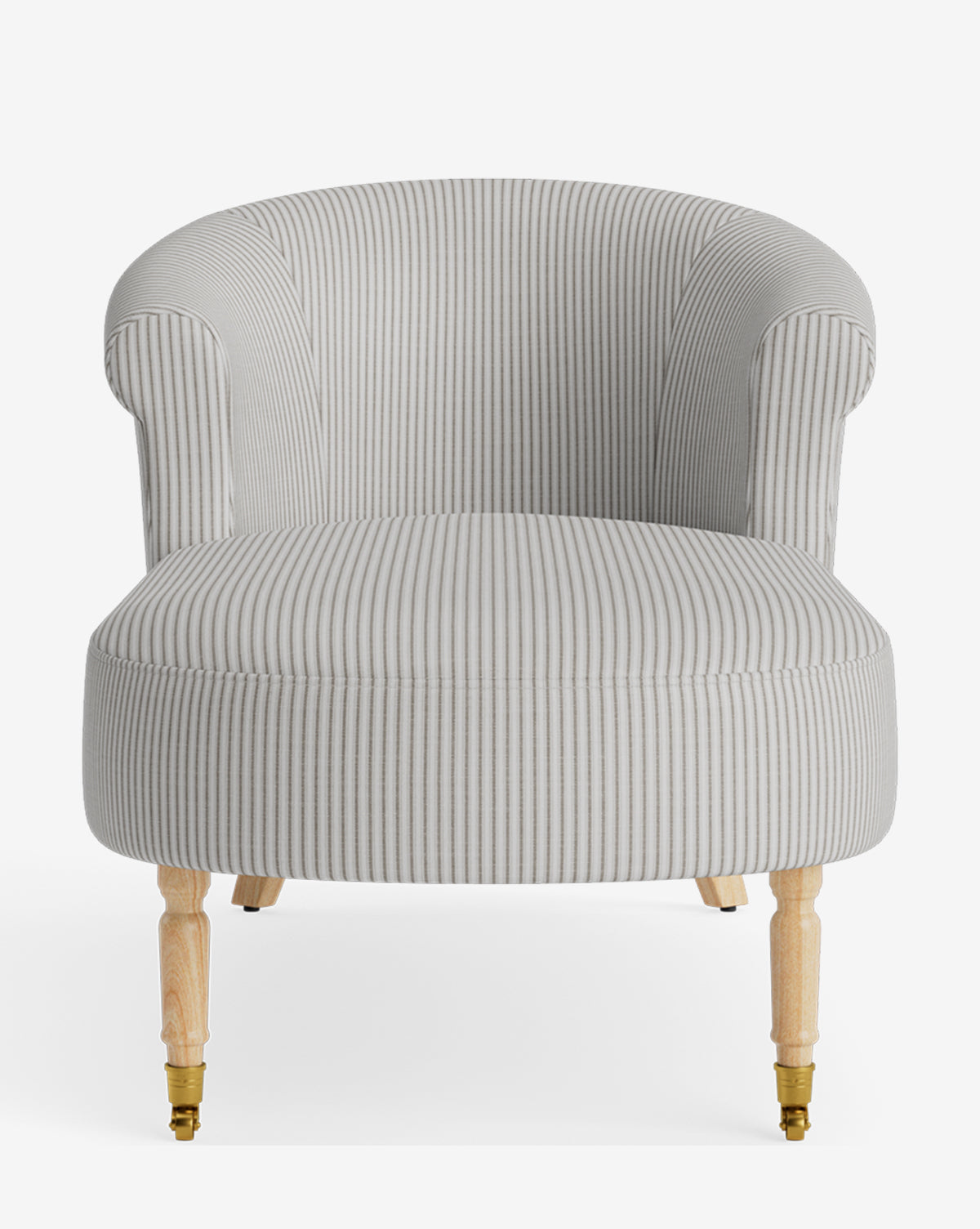 The Clemence Chaise, upholstered in light gray with vertical white pinstripes, features a curved backrest and four light wooden legs—front legs with brass castor wheels—to add customizable style to your living space, by McGee & Co.