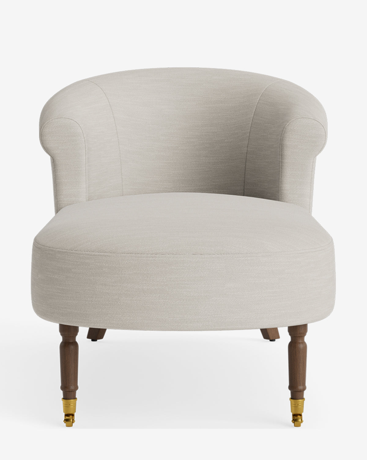 The Clemence Chaise features light beige upholstery, a rounded backrest, curved arms, and dark wooden legs with brass front casters—bringing classic chaise lounge elegance to customizable furniture collections, by McGee & Co.