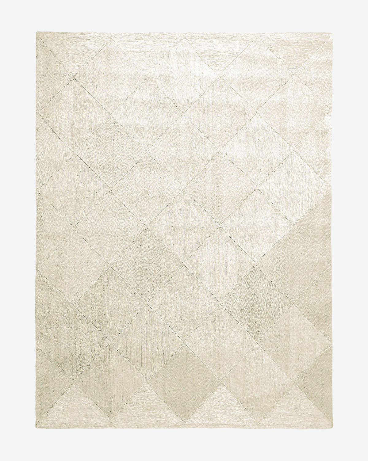 The Diamond Braided Bleached Jute Rug is a hand-woven rectangular rug featuring a subtle geometric diamond pattern in beige and cream tones on a light background, showcasing minimalist, modern style and organic beauty by McGee & Co.