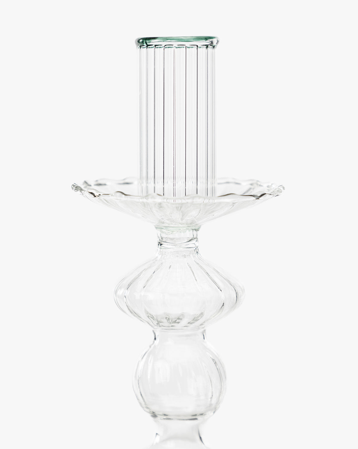 The McGee & Co. x Loeffler Randall Effie Taper Holder is a clear glass piece with ribbed and scalloped detailing, offering elegant decoration against a plain white background, by McGee & Co.