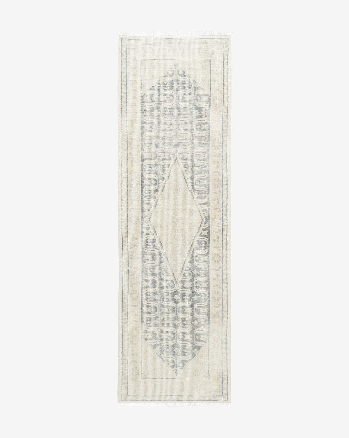 McGee & Co. hand-knotted rug with cream and blue tones