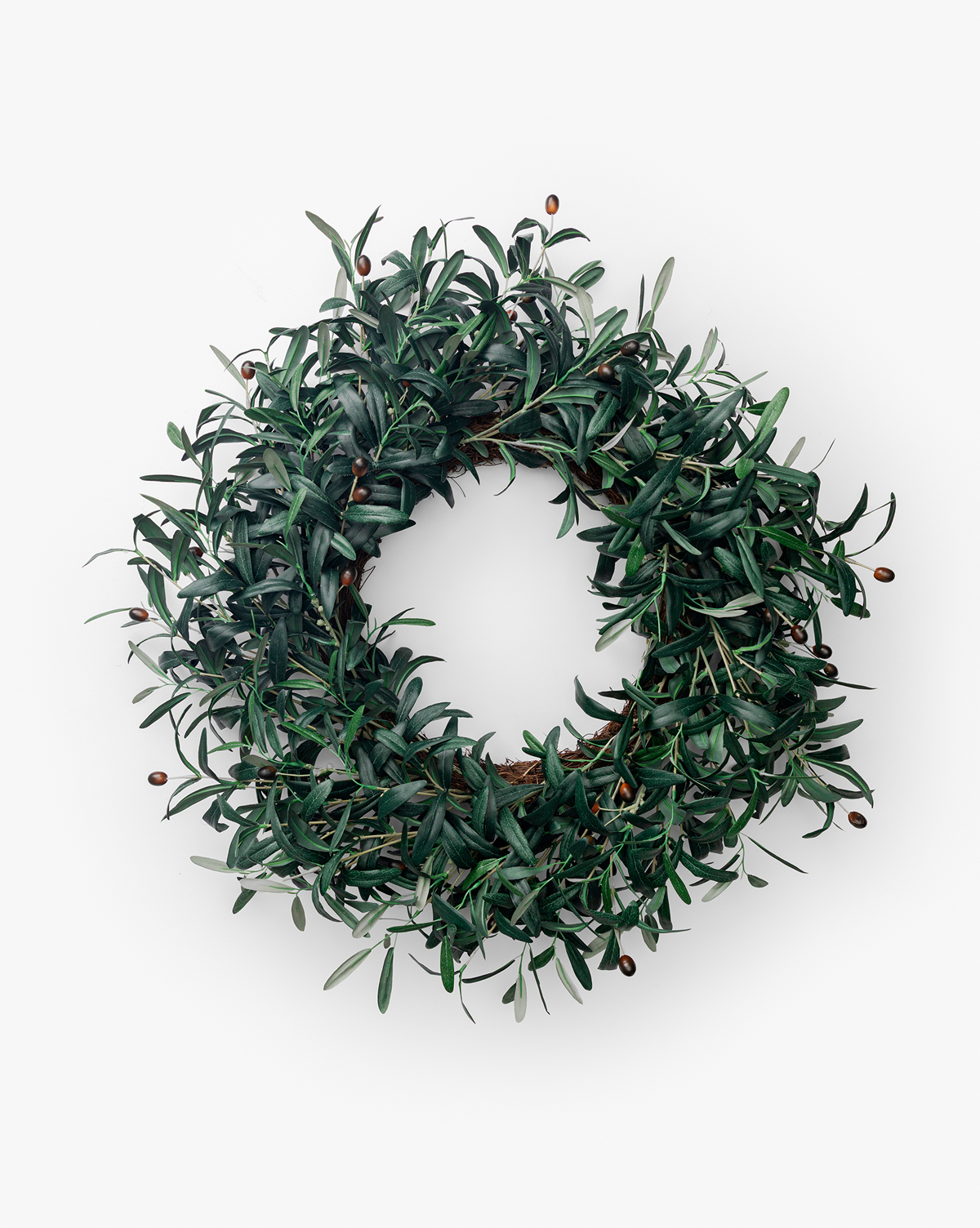 The Faux Olive Berry Wreath features dark green leaves and small brown berries in a circular design, shown against a plain white background, by McGee & Co.