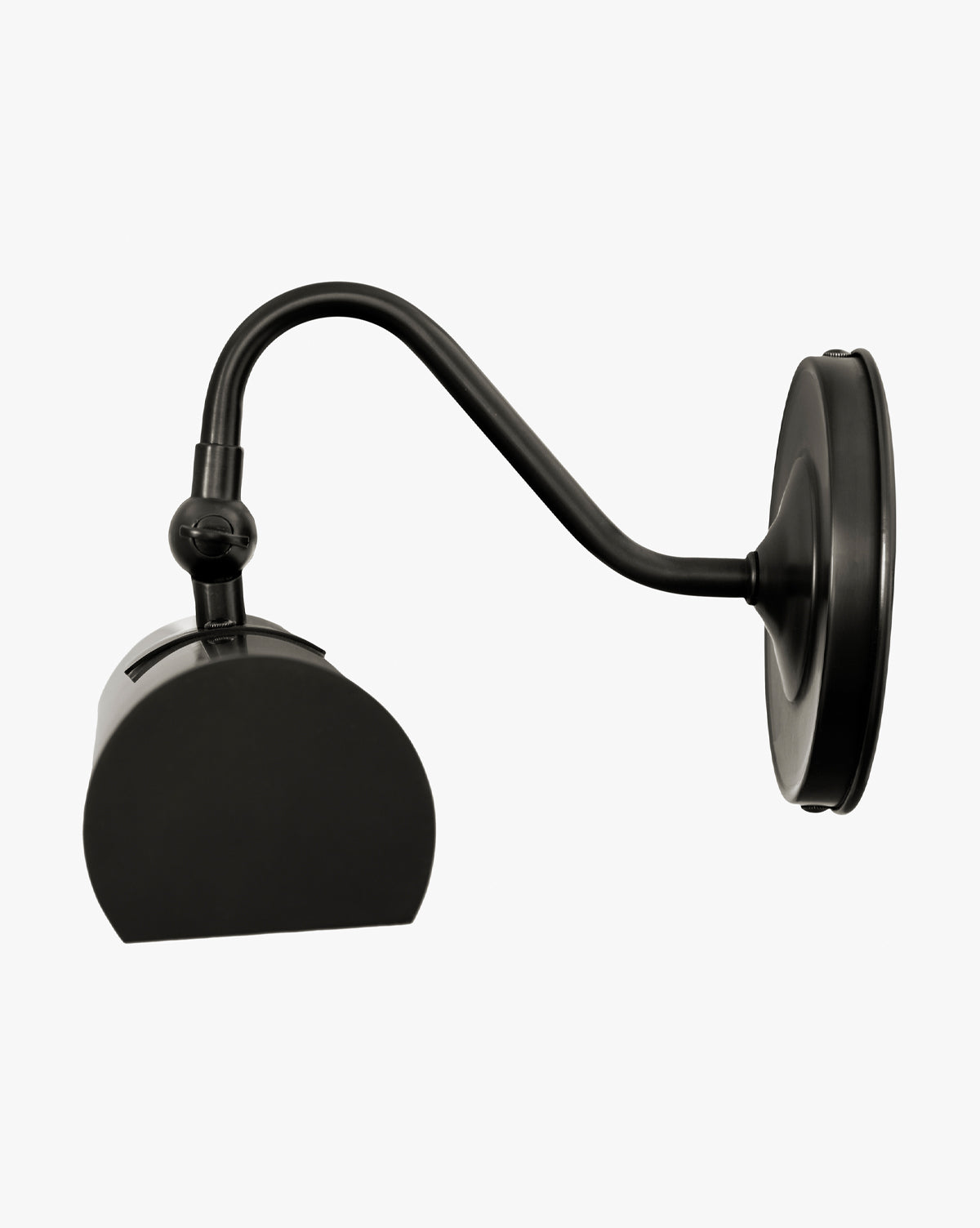The Gallery Picture Sconce features a modern black finish, curved arm, round base, and a geometric half-cylinder shade for a sleek contemporary style, by McGee & Co.