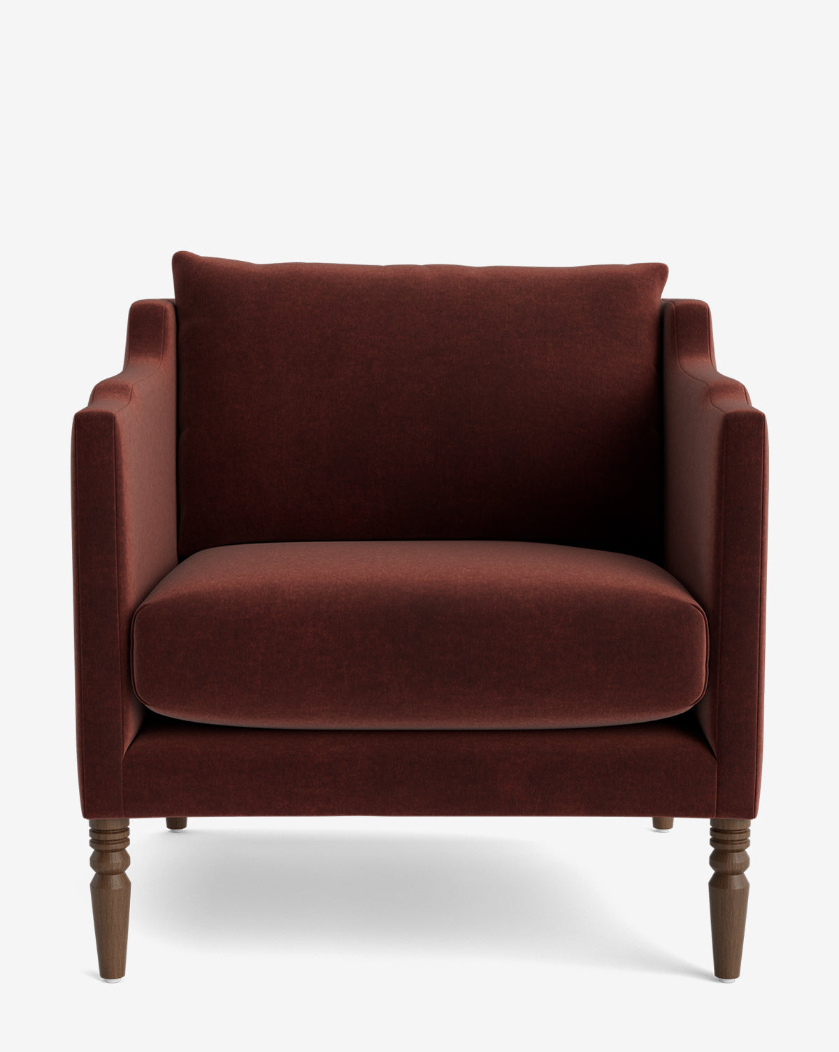 The Gemma Lounge Chair is a wide, deep armchair with straight arms, a cushioned back, and traditional turned wooden legs. Its upholstered in premium burgundy fabric and photographed against a plain white background by McGee & Co.