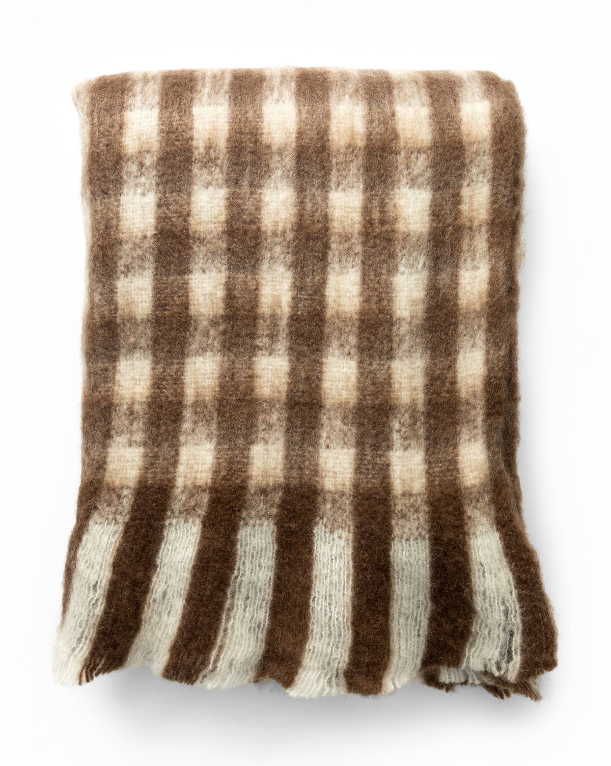 The Indaba Gingham Wool Blend Throw features a fluffy, folded design with a brown and cream checkered pattern and wide cream stripes at one end, displayed on a white background. McGee & Co.