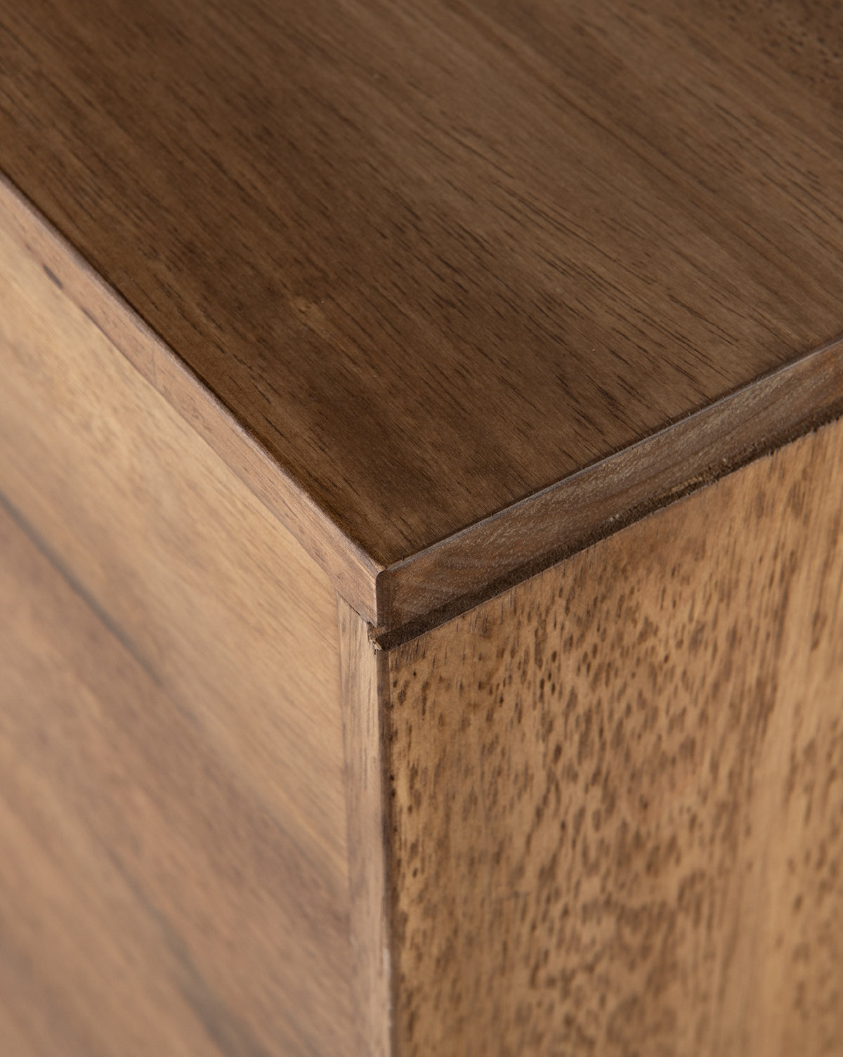 Close-up of Gustav Console corner shows its smooth surface, light brown natural wood grain, and smart media cord management for a seamless mid-century look, by McGee & Co.