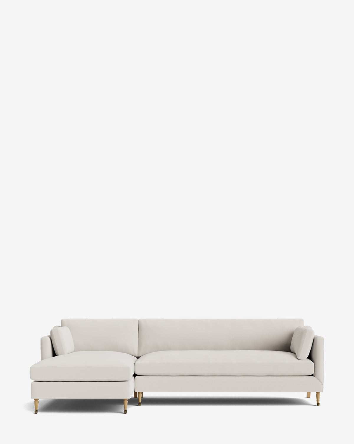 The Rowe Fine Furniture Haverford Upholstered Left Chaise Sectional in light gray features gold-tipped legs and two cylindrical pillows, shown against a plain white background, McGee & Co.