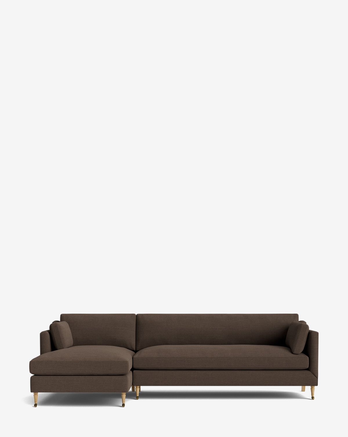 The Rowe Fine Furniture Haverford Upholstered Left Chaise Sectional in dark brown features gold-toned legs and two matching cylindrical cushions, blending comfort and style for contemporary spaces. Set against a plain white background. McGee & Co.
