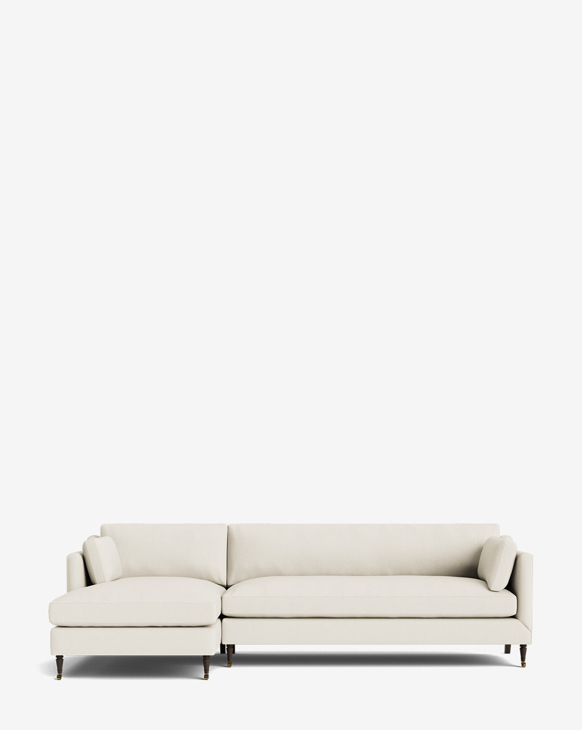The Haverford Upholstered Left Chaise Sectional features a modern, light beige design with slim armrests and wooden legs, shown against a plain white background by McGee & Co.