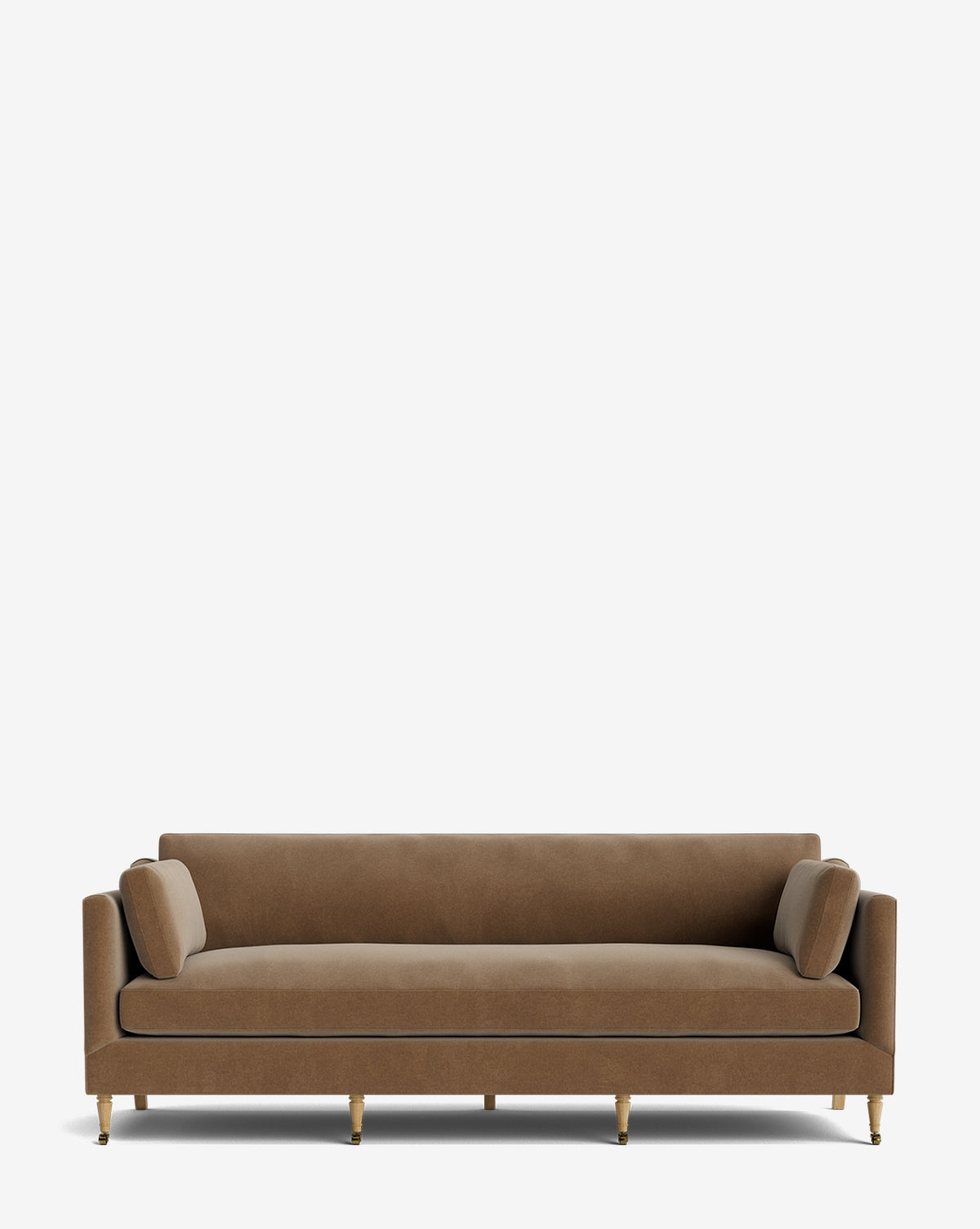 The Haverford Upholstered Sofa 90 showcases a modern brown design with two matching cylindrical bolster pillows, straight back and arms, and gold-toned legs, all beautifully handcrafted and set against a plain white background by McGee & Co.