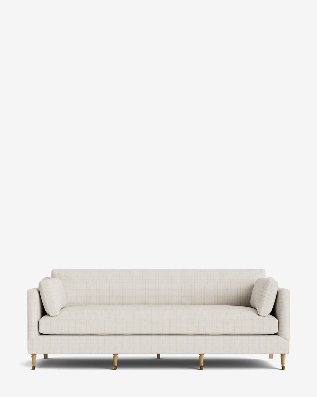 The Haverford Upholstered Sofa 90 features a modern light beige look with a clean rectangular design, slim arms, two cylindrical side cushions, and gold-tipped wooden legs, pictured against a plain white background by McGee & Co.