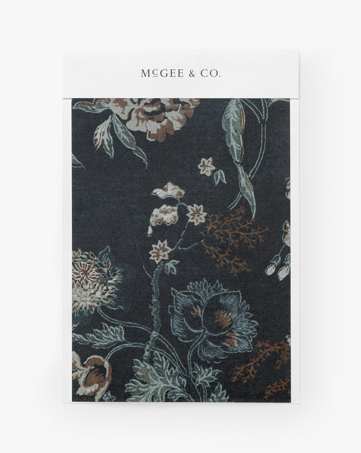 A sample Hestercombe Floral Wallpaper Swatch with a dark background and painterly floral design in muted beige, brown, green, and blue, displayed on a card labeled MCGEE & CO. at the top, by McGee & Co.