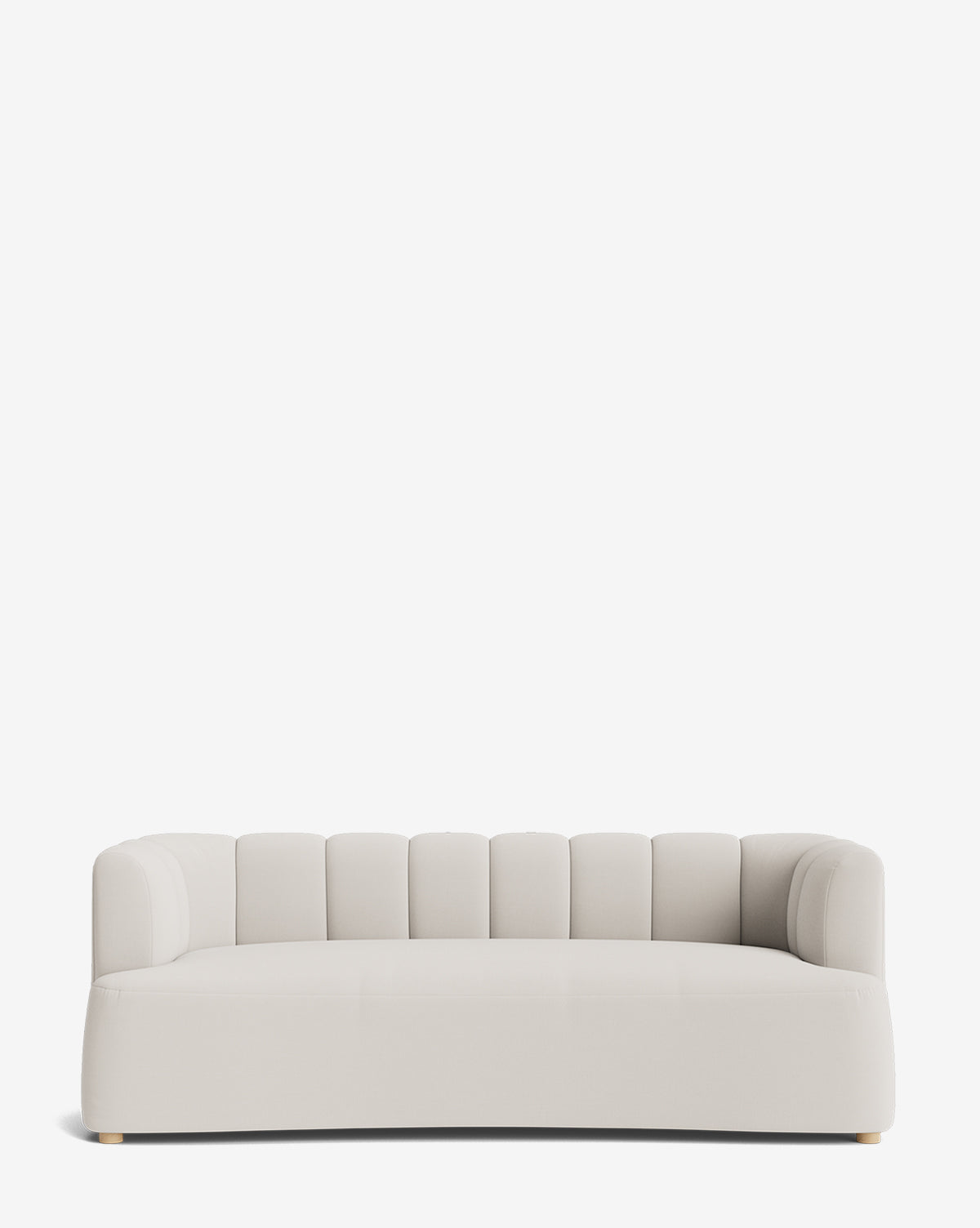 The Ines Sofa 90 is a modern, low-profile beige velvet sofa featuring rounded arms and vertical tufting along the backrest, shown against a plain white background by McGee & Co.