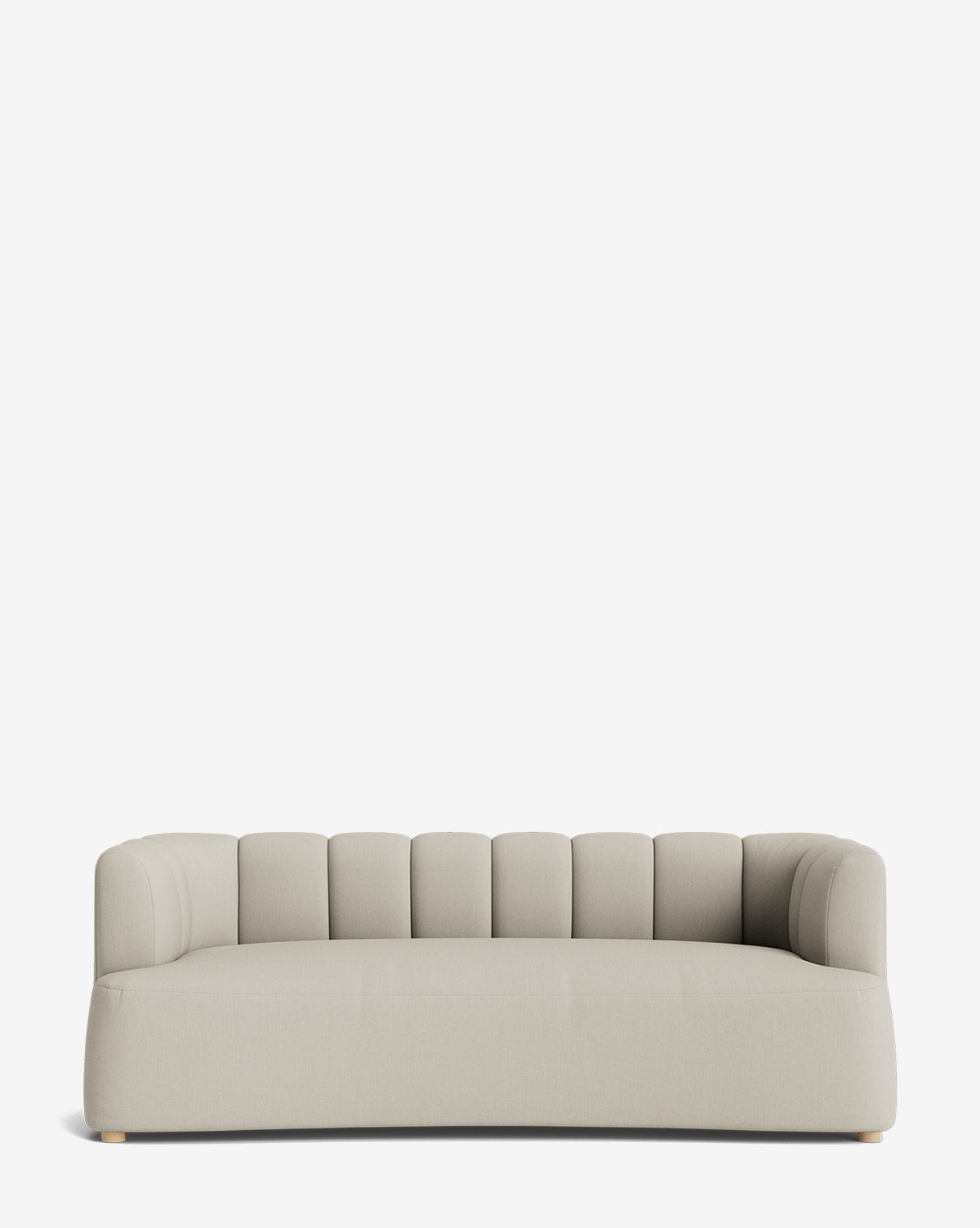 The Ines Sofa 90 is a modern light gray velvet sofa with rounded edges, low arms, and a vertically channeled backrest. Set against a plain white background, it features elegant wooden feet for a minimalist look by McGee & Co.