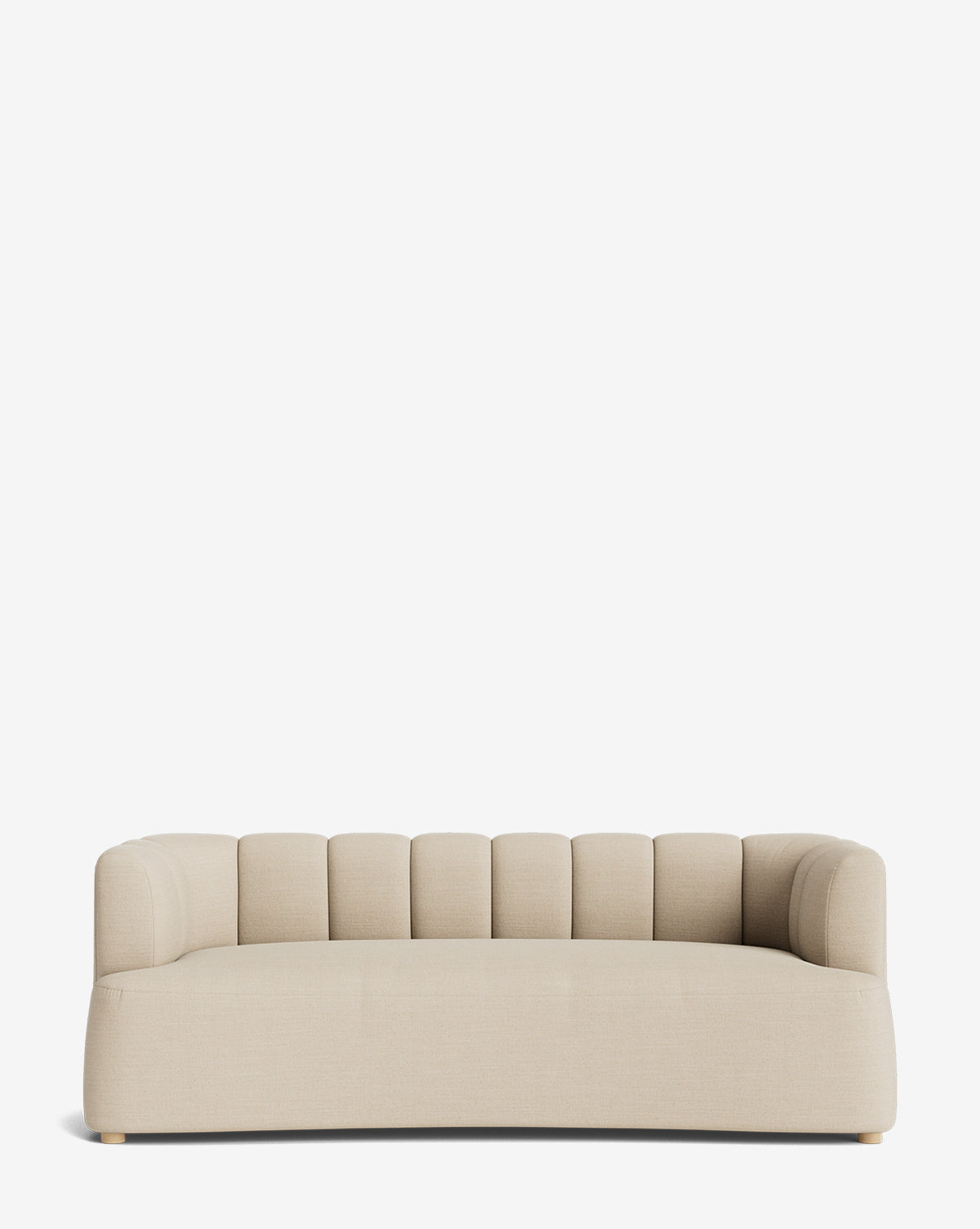 The Ines Sofa 90 is a modern beige velvet sofa with rounded edges and a low backrest featuring vertical tufting, displayed against a plain white background by McGee & Co.