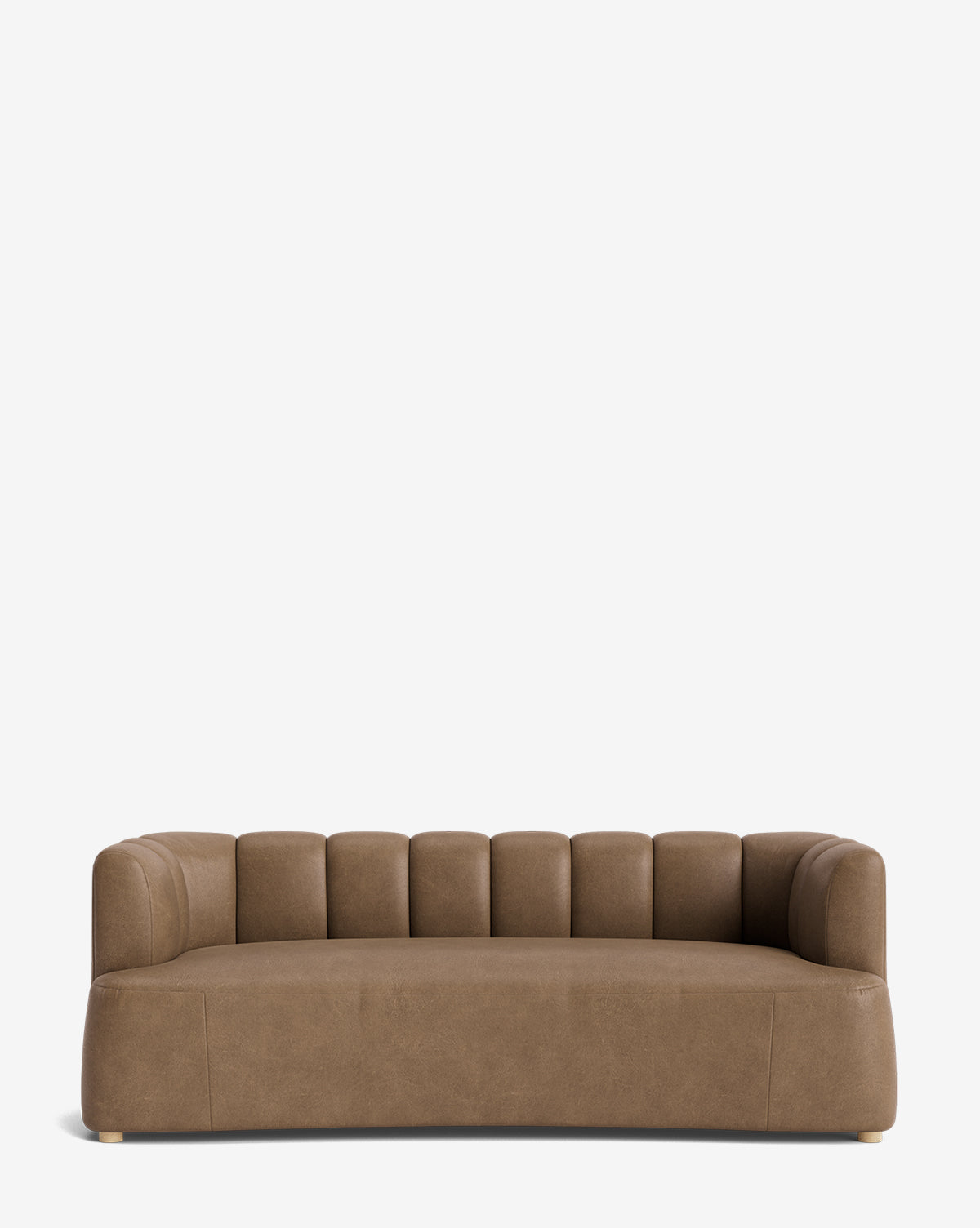 The Ines Sofa 90 is a modern velvet sofa with low back and sides, vertical tufted detailing on the backrest and armrests, and short light wood feet, shown against a plain white background by McGee & Co.