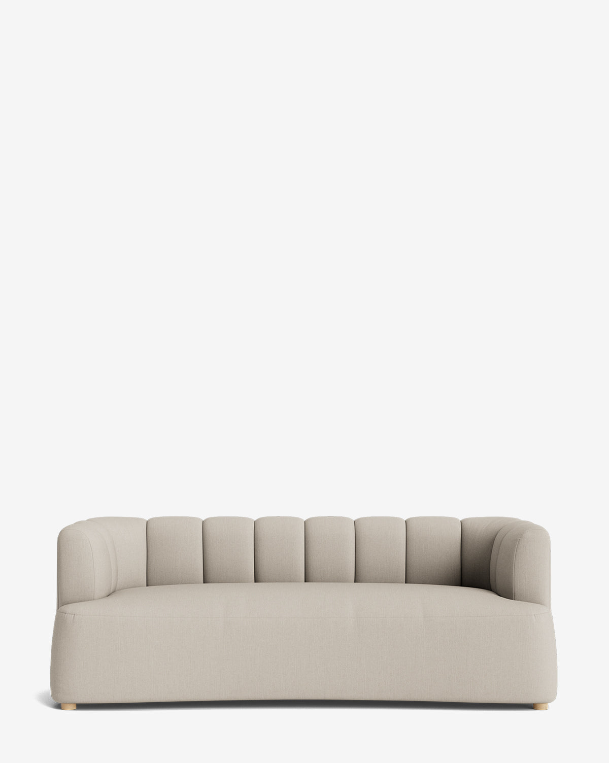 The Ines Sofa 90 is a modern beige velvet sofa with rounded arms and a low backrest, featuring vertical tufted detailing, set against a plain white background by McGee & Co.