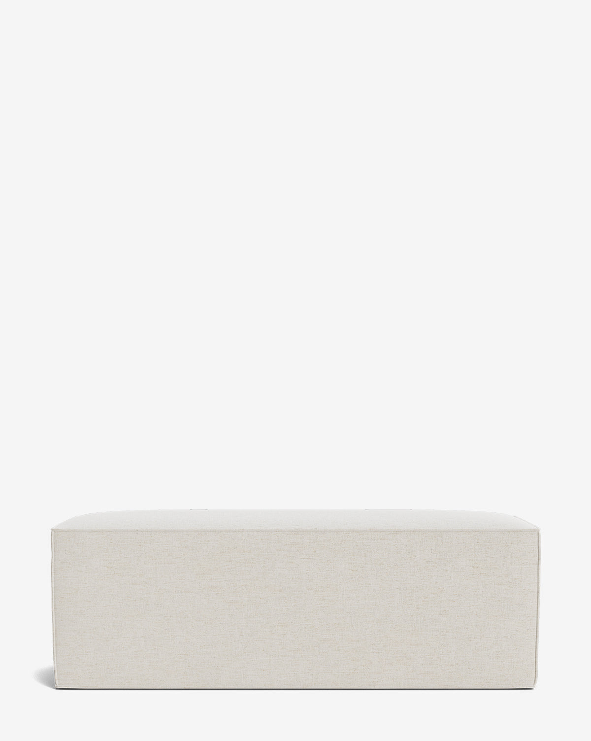 The Johannes Bench is a rectangular, beige cushioned bench with clean lines and smooth fabric, shown against a plain white background by McGee & Co.