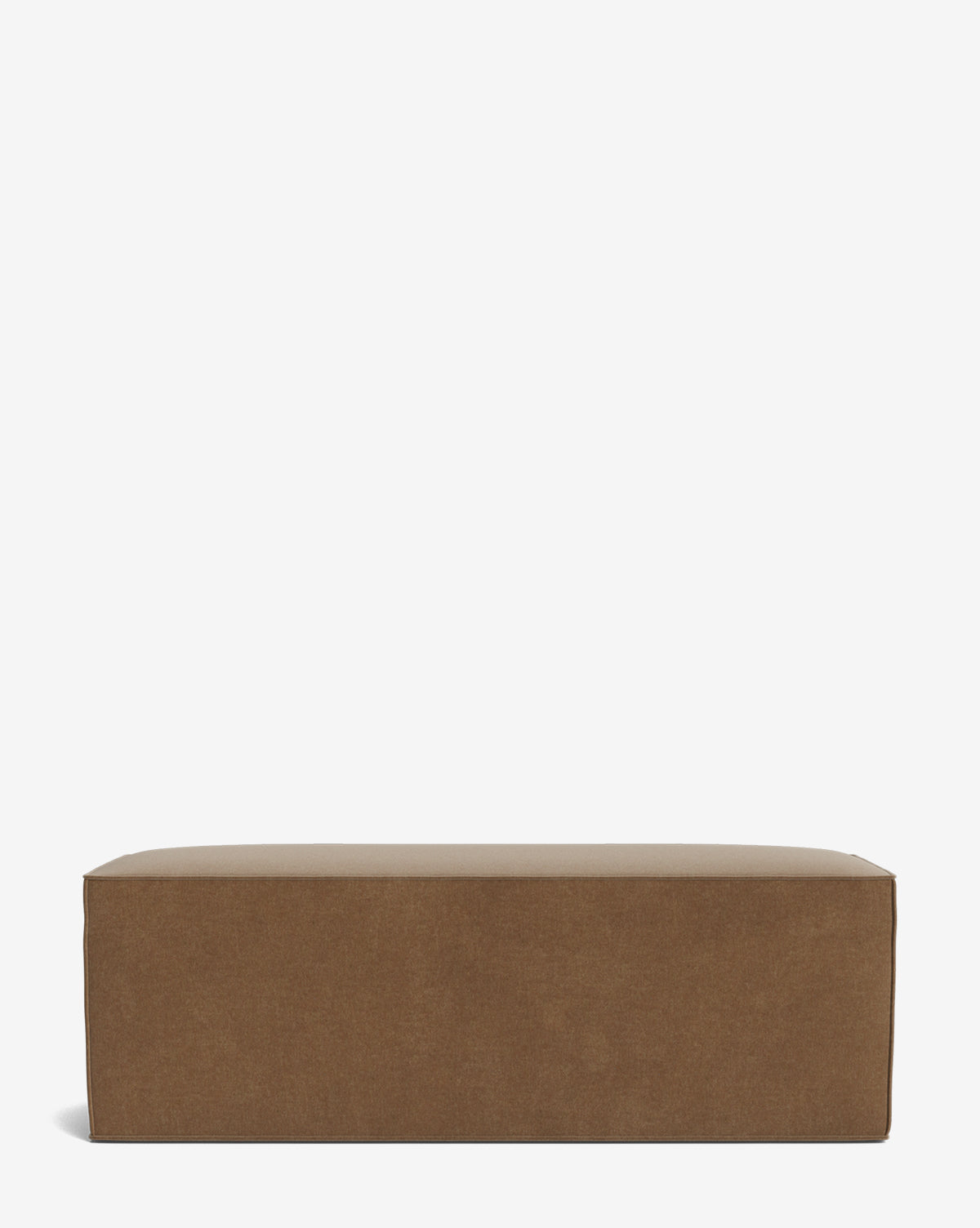 The Johannes Bench is a rectangular brown ottoman with a minimalist, modern design, displayed against a plain white background by McGee & Co.