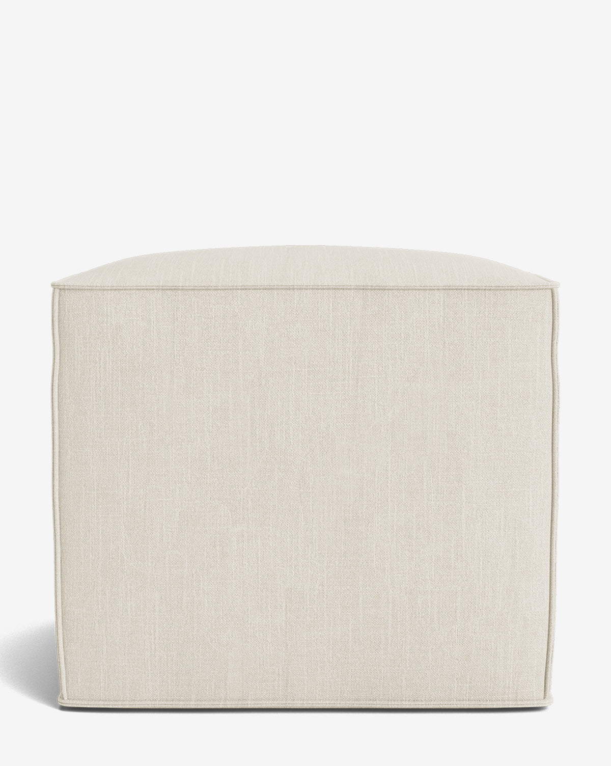 The Johannes Cube is a square, light beige ottoman with a cushioned seat and subtly textured fabric, featuring a minimalist design, by McGee & Co. Shown against a white background.