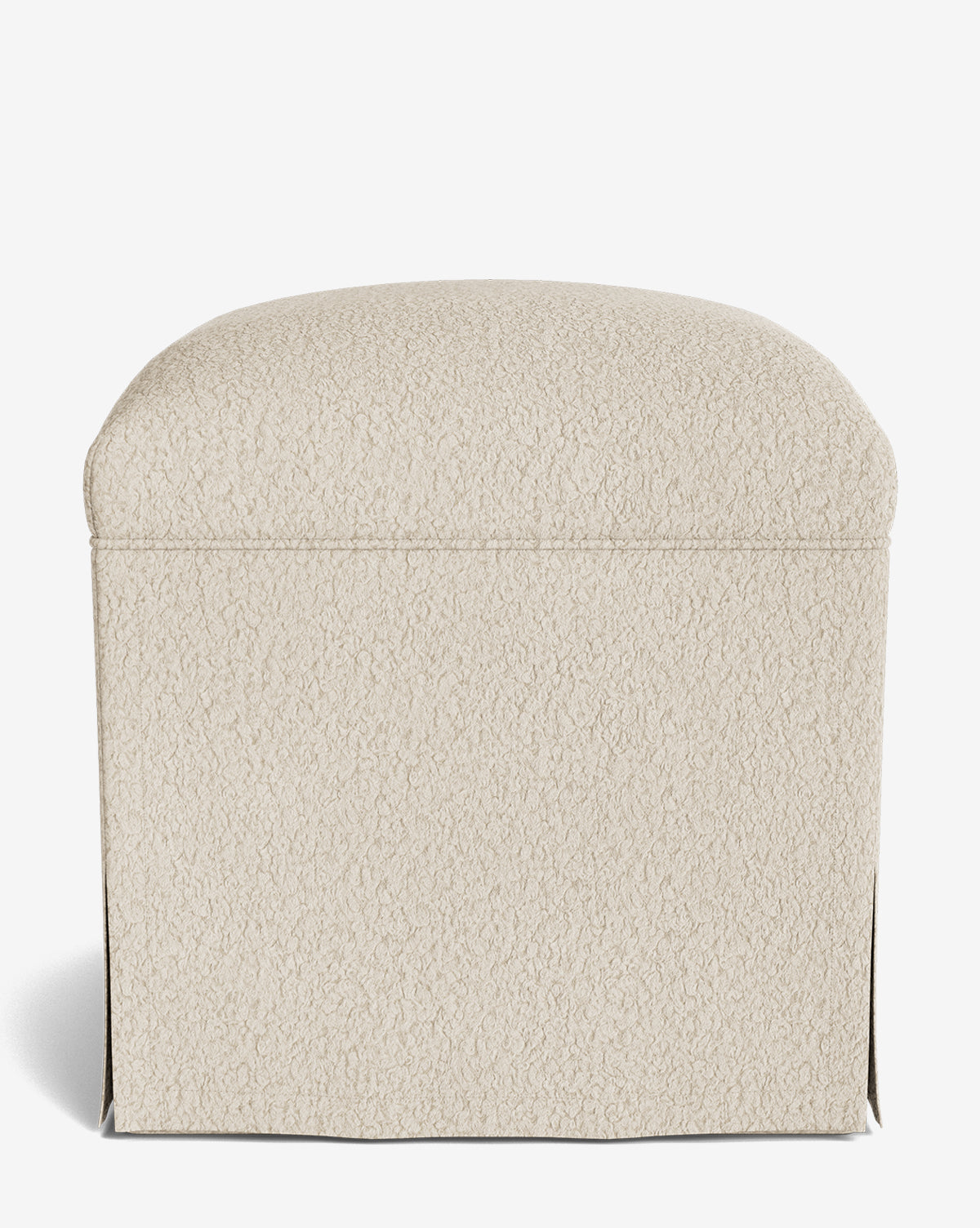 The Makerspalm Latimer Ottoman is a cream, square piece made from high-quality textured fabric with soft, rounded edges, shown on a plain white background. McGee & Co.