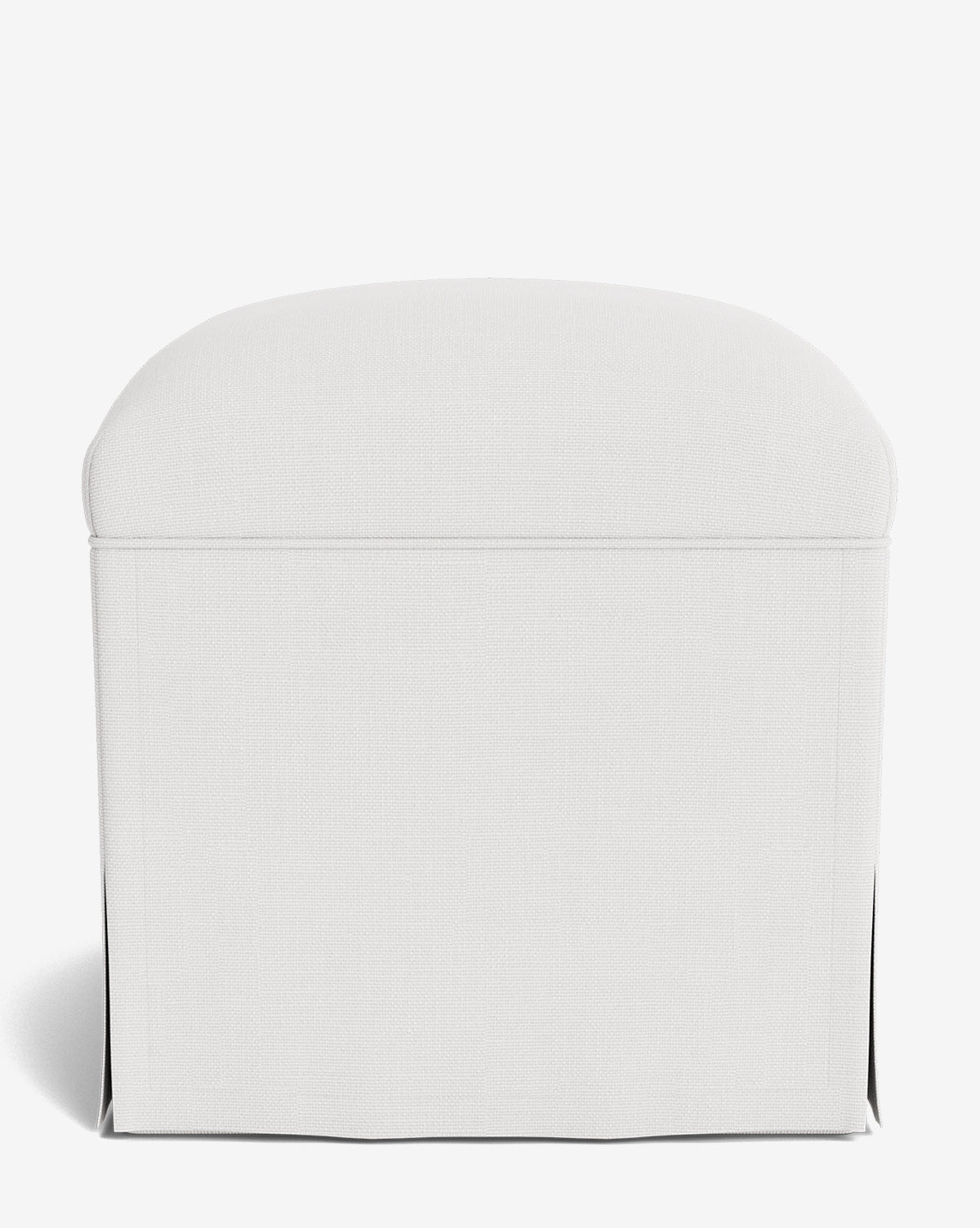 The Makerspalm Latimer Ottoman is a white, rectangular upholstered ottoman with a gently rounded top and tailored skirt, crafted from premium fabrics and shown against a plain white background. McGee & Co.