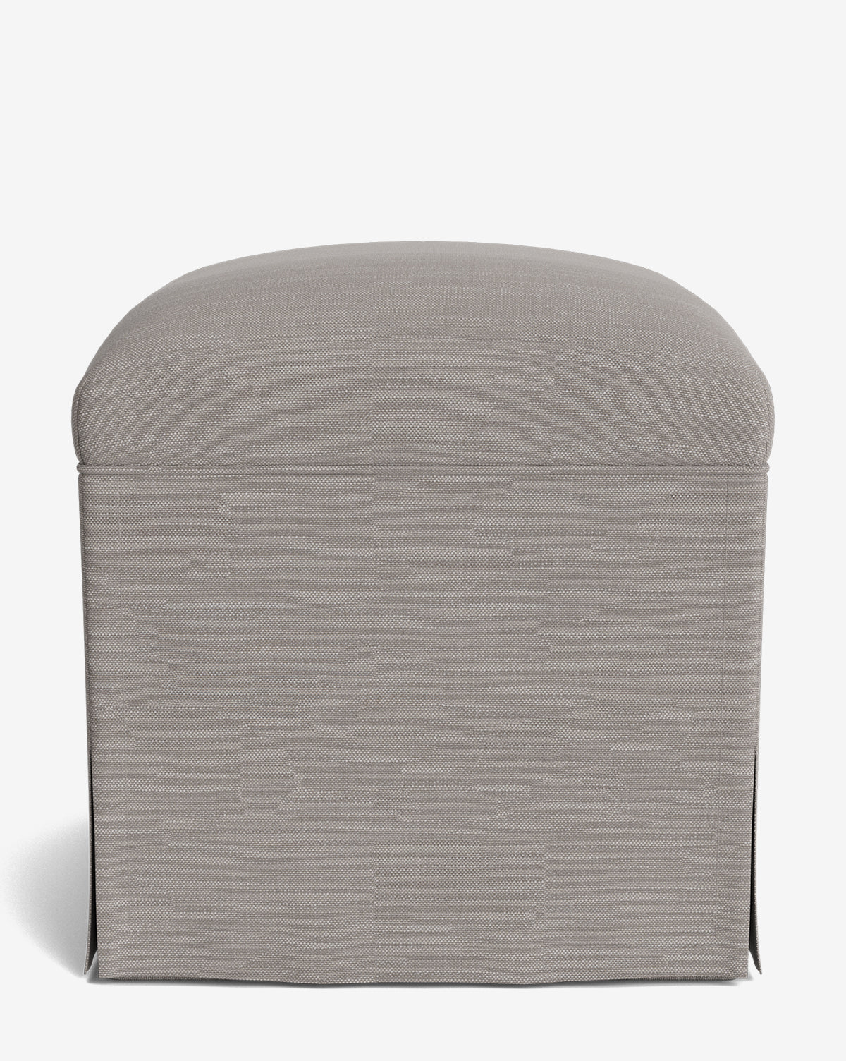 The Makerspalm Latimer Ottoman is a rectangular, light gray upholstered piece featuring a soft curved top and tailored skirt, crafted from high-quality fabrics by McGee & Co.
