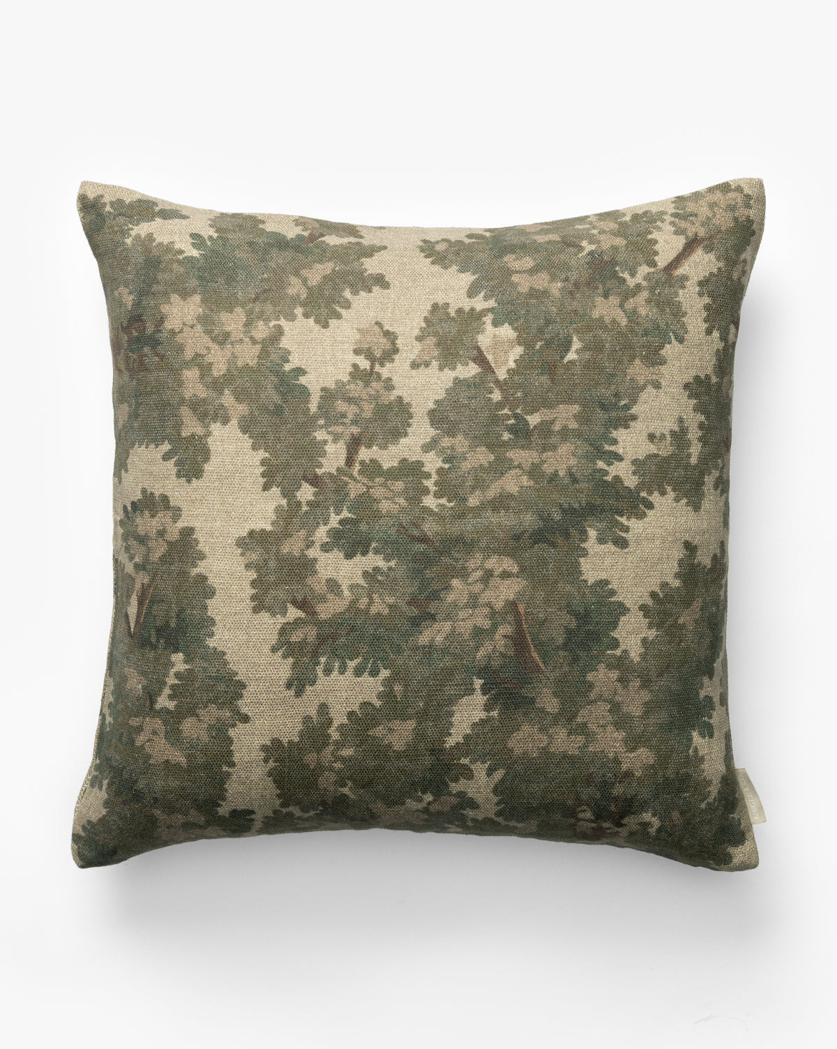 The Lucetta Pillow Cover features a beige background with a green leafy tree branch pattern, bringing earthy tones and nature-inspired style to your space against a crisp white surface, by McGee & Co.