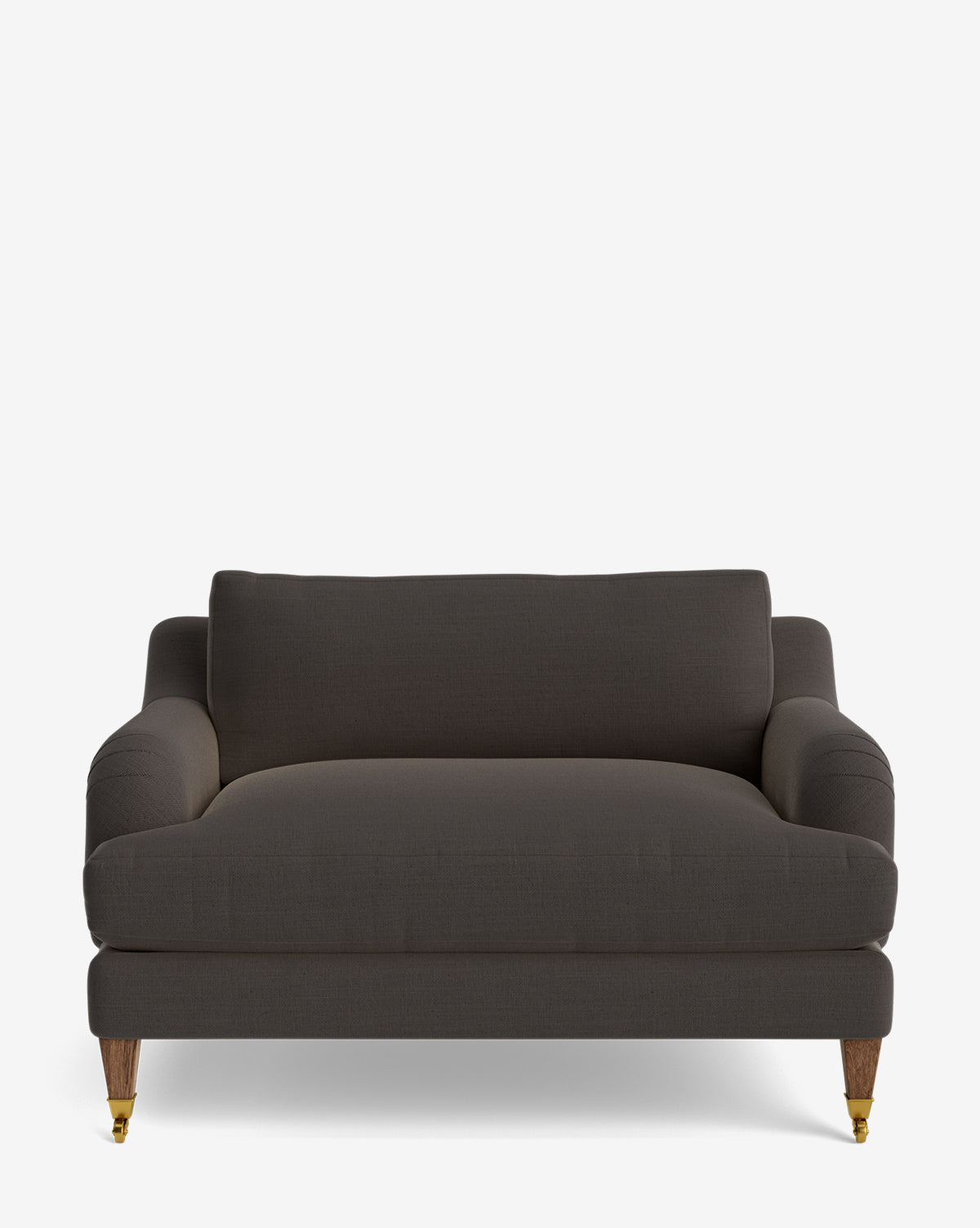 The Lucille English Roll Arm Chair and a Half is a dark gray upholstered loveseat with down-wrapped cushions, rounded arms, a cushioned backrest, and short wooden legs with front brass casters, set against a plain white background by McGee & Co.