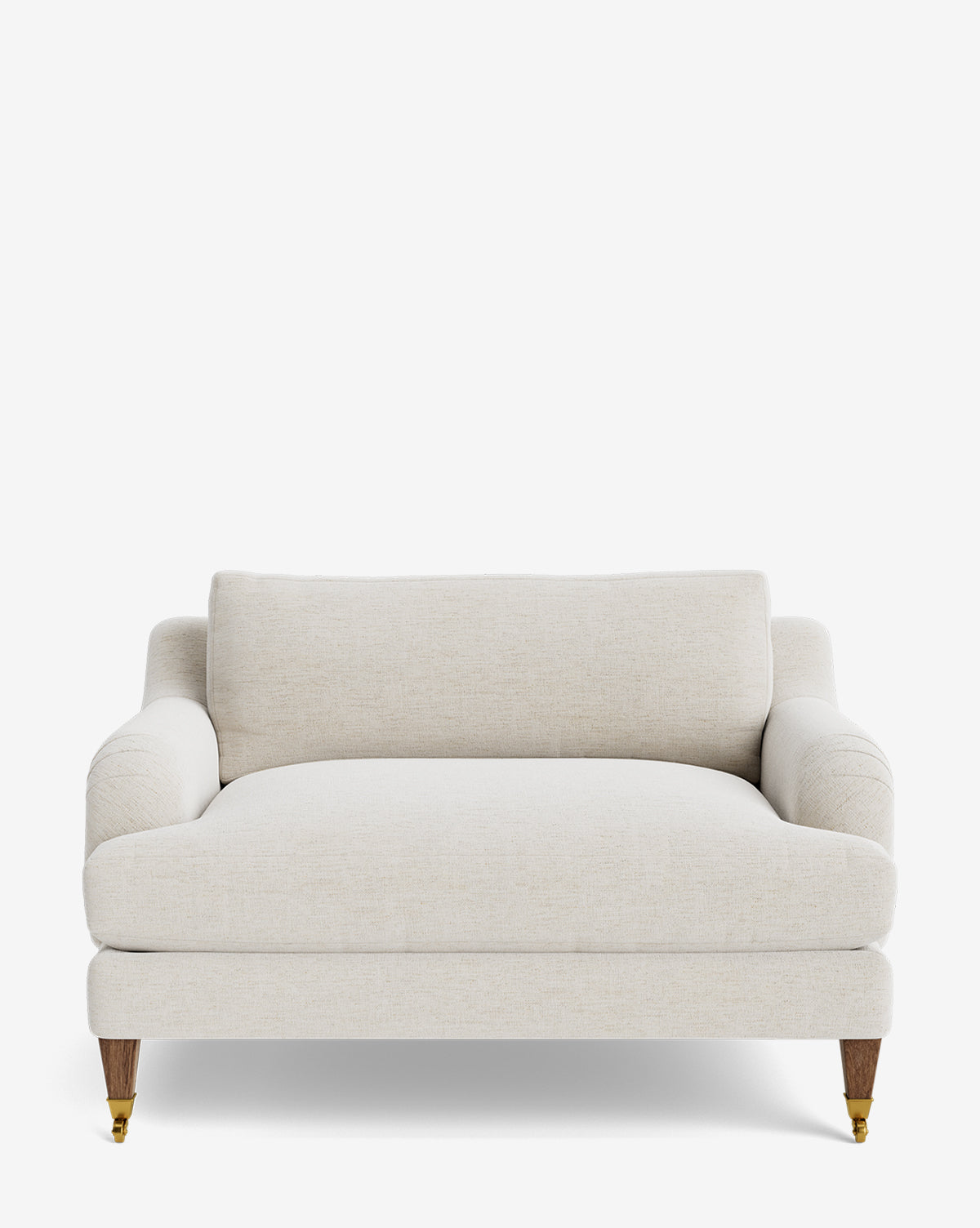 The Lucille English Roll Arm Chair and a Half is cream-colored and upholstered, featuring classic rounded arms, a single down-wrapped cushion, and short wooden legs—two with brass casters—shown on a plain white background by McGee & Co.