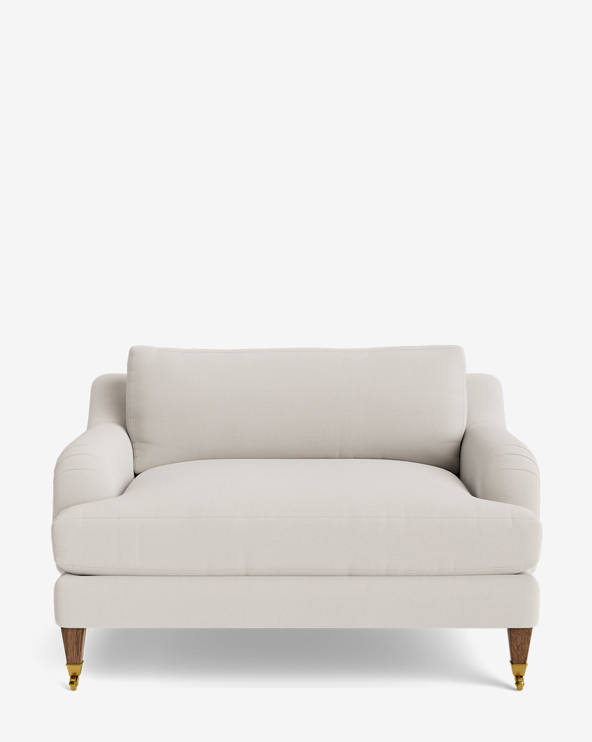 The Lucille English Roll Arm Chair and a Half is a modern cream-colored loveseat featuring plush down-wrapped cushions, curved armrests, wooden legs, and brass caster wheels, shown against a plain white background by McGee & Co.