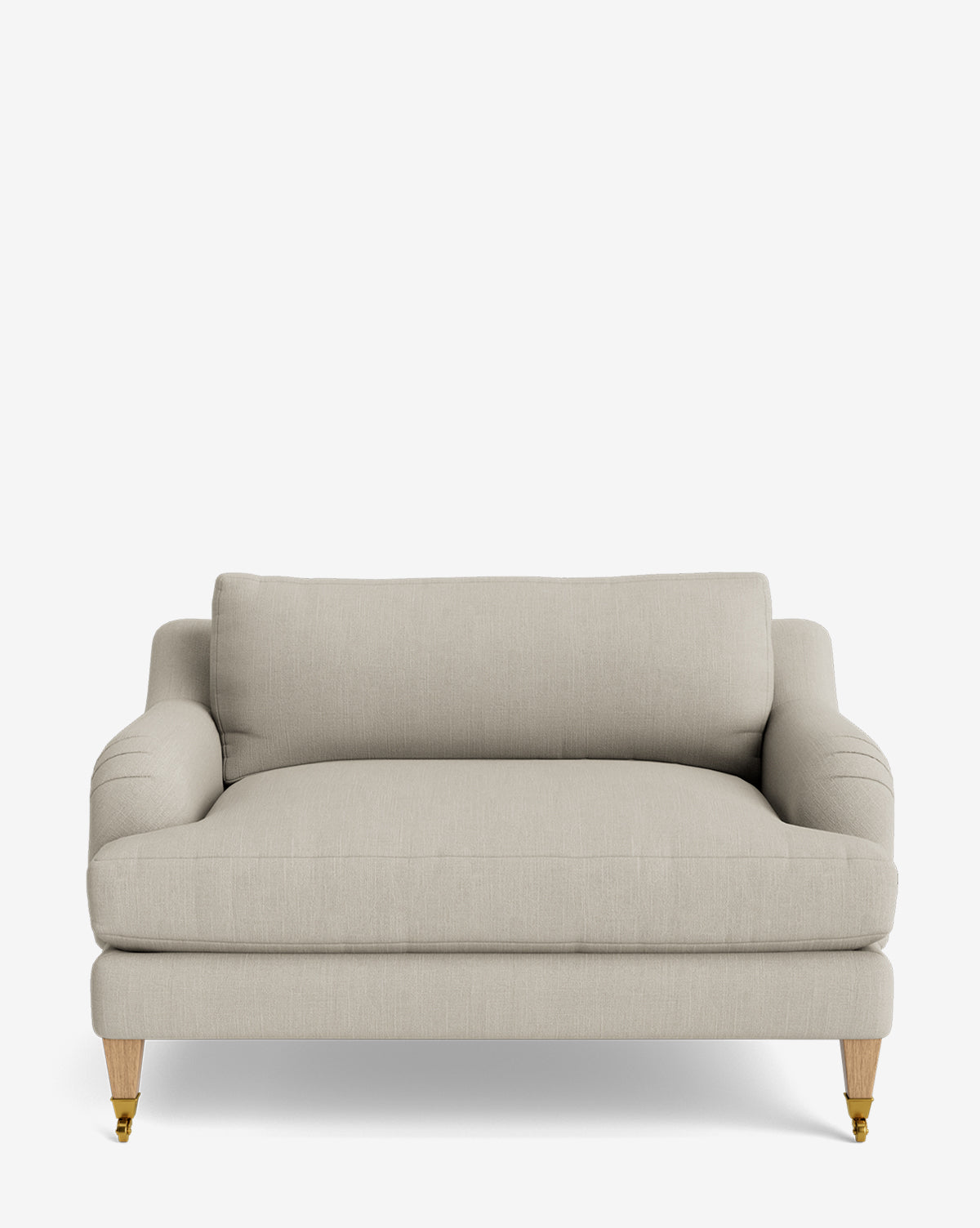 The Lucille English Roll Arm Chair and a Half features beige upholstery, down-wrapped cushion, rounded arms, and light wooden legs with brass front casters, displayed against a plain white background by McGee & Co.