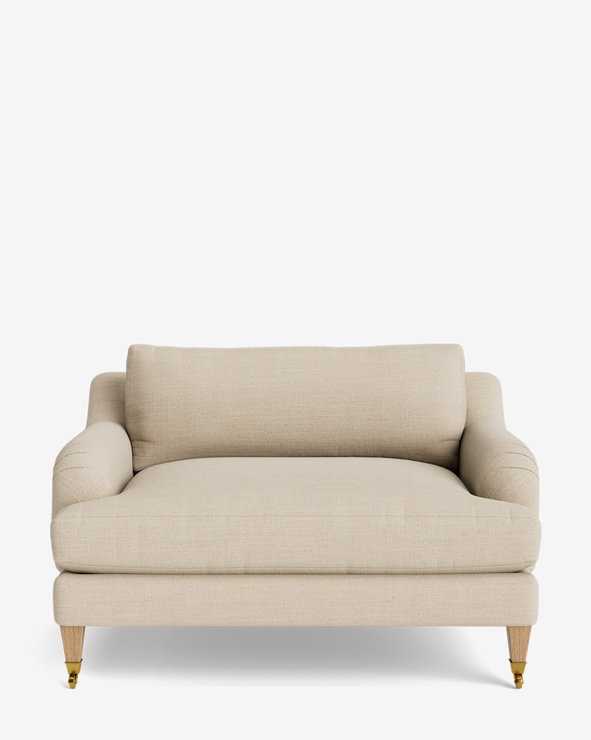 The Lucille English Roll Arm Chair and a Half features cream upholstery, down-wrapped cushions, rounded armrests inspired by the English Roll Arm style, and wooden legs with gold front casters, shown against a plain white background by McGee & Co.