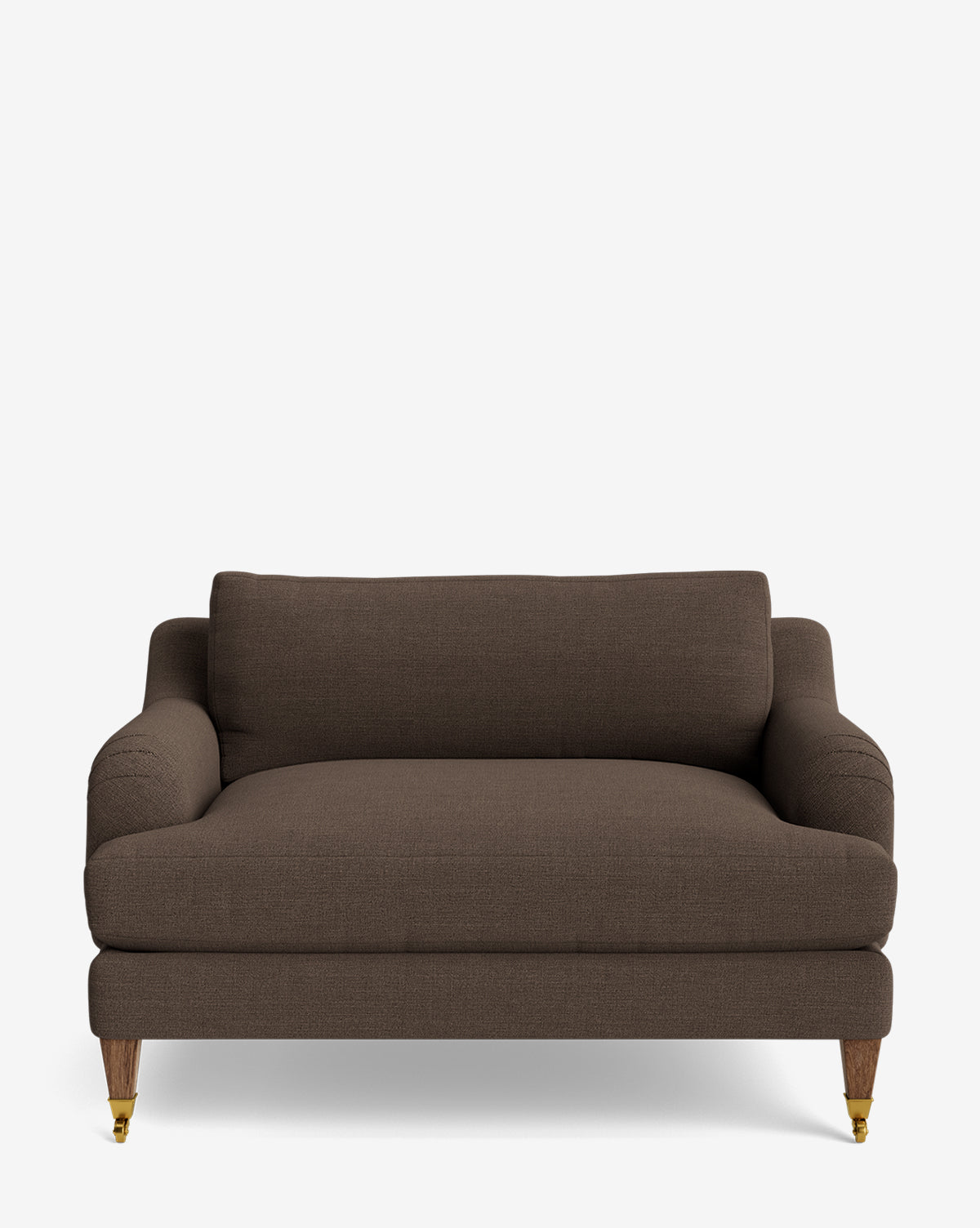 The Lucille English Roll Arm Chair and a Half is a dark brown loveseat with rounded arms, thick down-wrapped seat and back cushions, four wooden legs (front two with brass casters), set against a plain white background by McGee & Co.