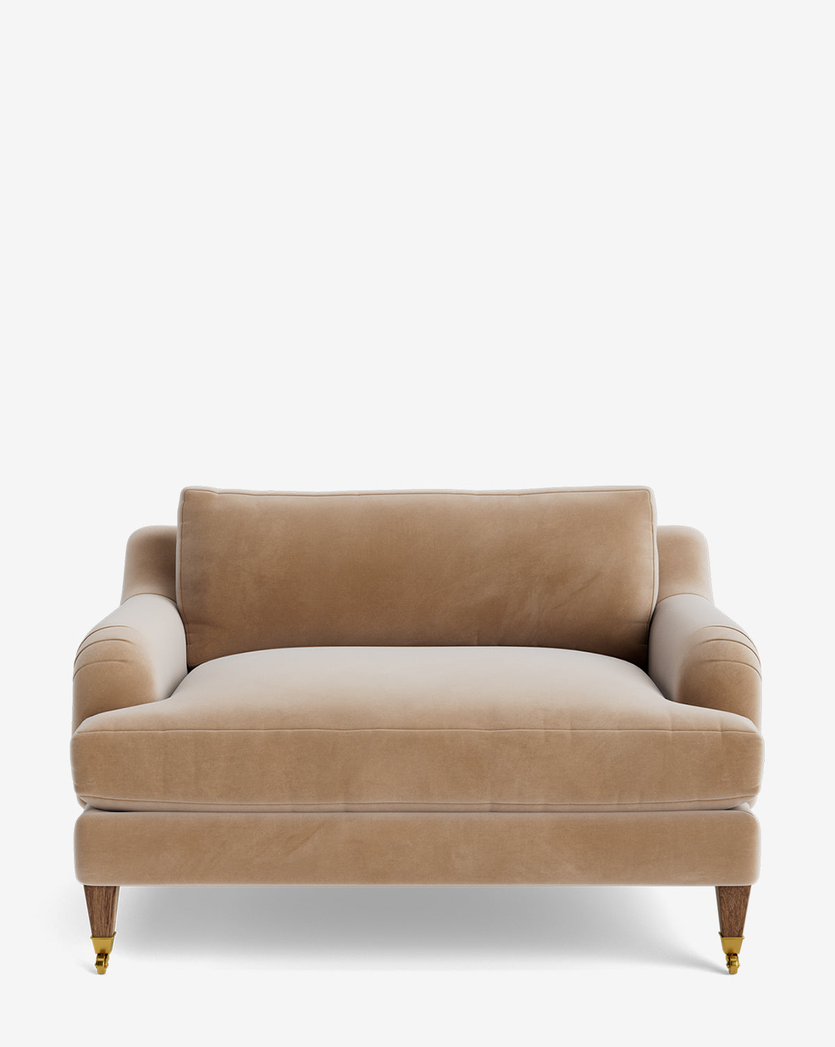 The Lucille English Roll Arm Chair and a Half features beige velvet upholstery, curved arms, a plush down-wrapped cushion, and turned wooden legs with brass caster wheels, shown against a white background by McGee & Co.