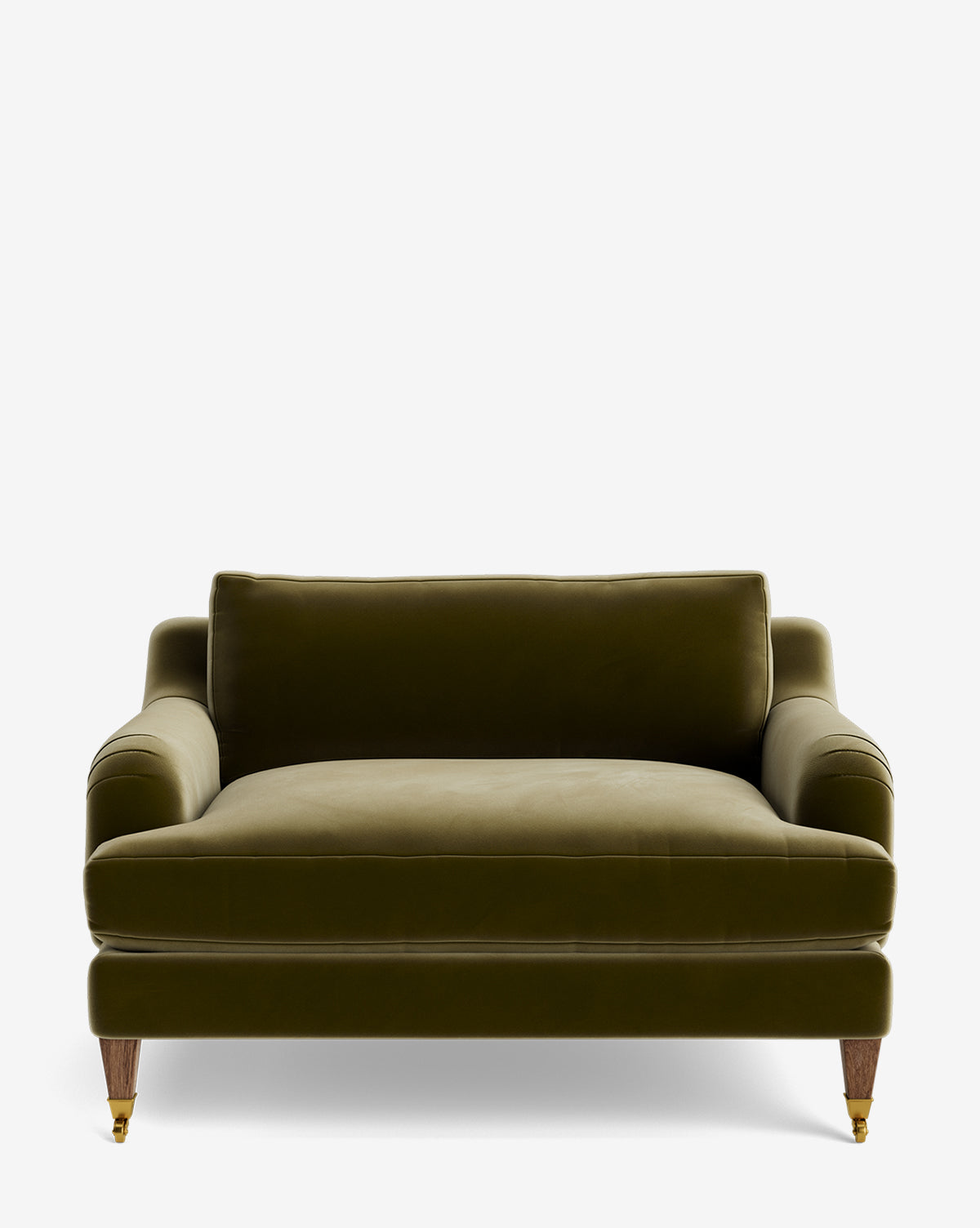 The Lucille English Roll Arm Chair and a Half is a green velvet loveseat with rounded arms, featuring down-wrapped and back cushions. It has four wooden legs, with brass castor wheels on the front, shown against a plain white background by McGee & Co.